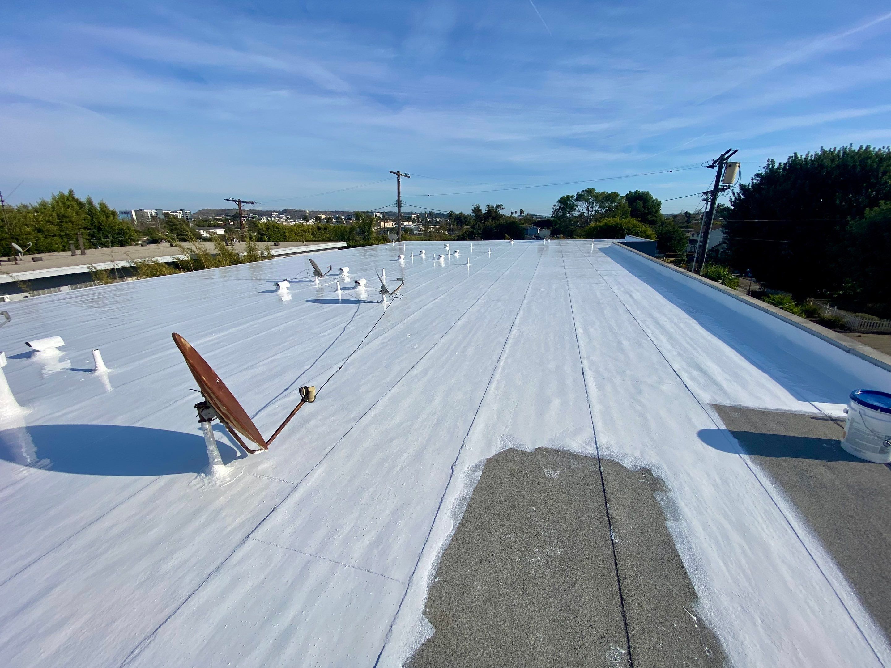 Apartment Building - Silicone Installation using ASC's Silicone Membrane by Hull Brothers Roofing