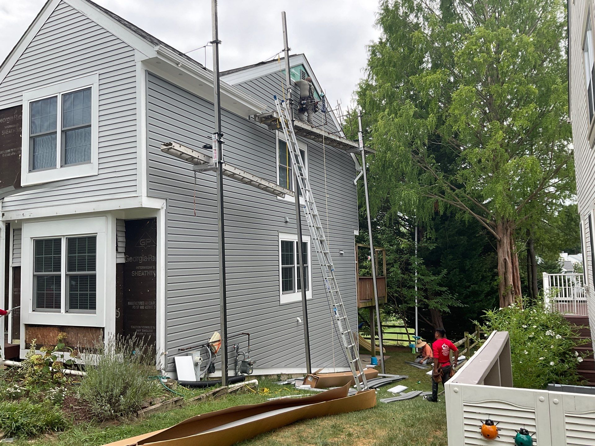 New Prodigy siding with One-piece insulated siding system & Exterior painting   by Alpha Design Services