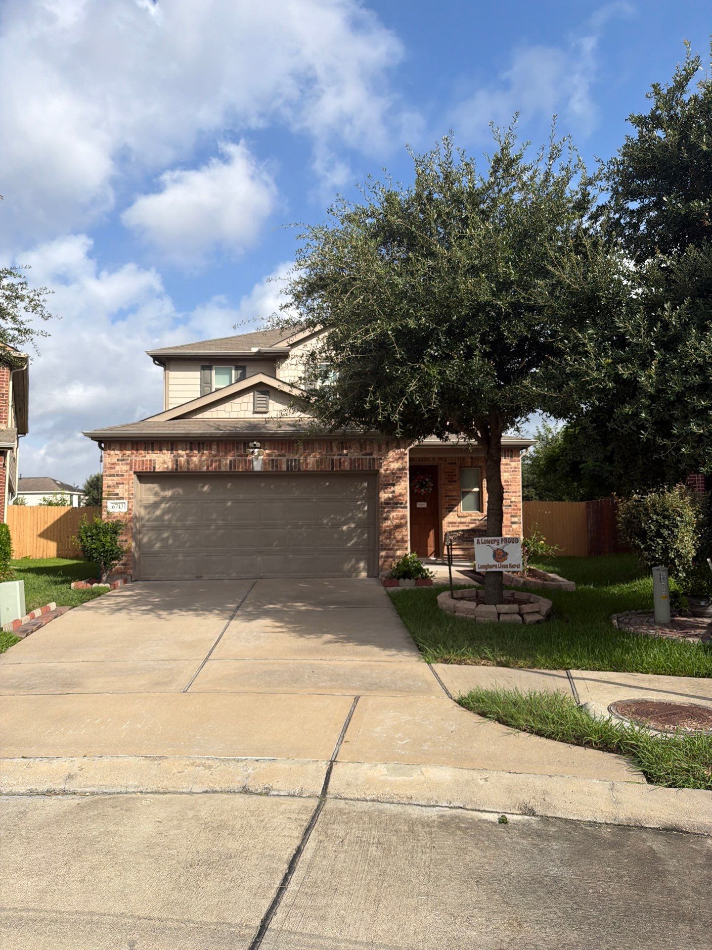 Owens Corning Shingle Roofing Replacement for Houston Two-Story Home by Houston Roofing & Construction