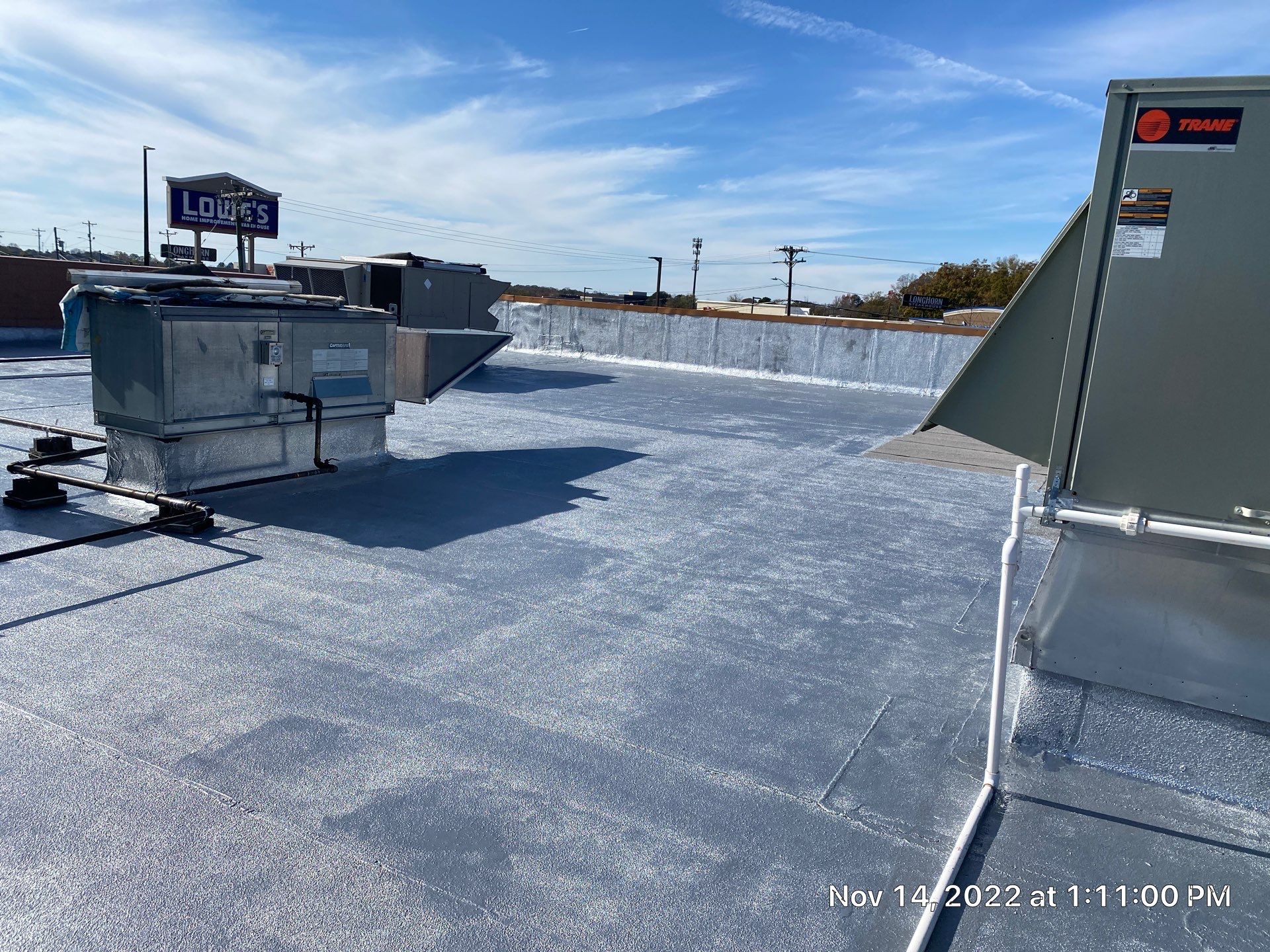 Commercial Coating using Poly Urerthane and Silicone Coating by Just In Time Roofing and Restoration