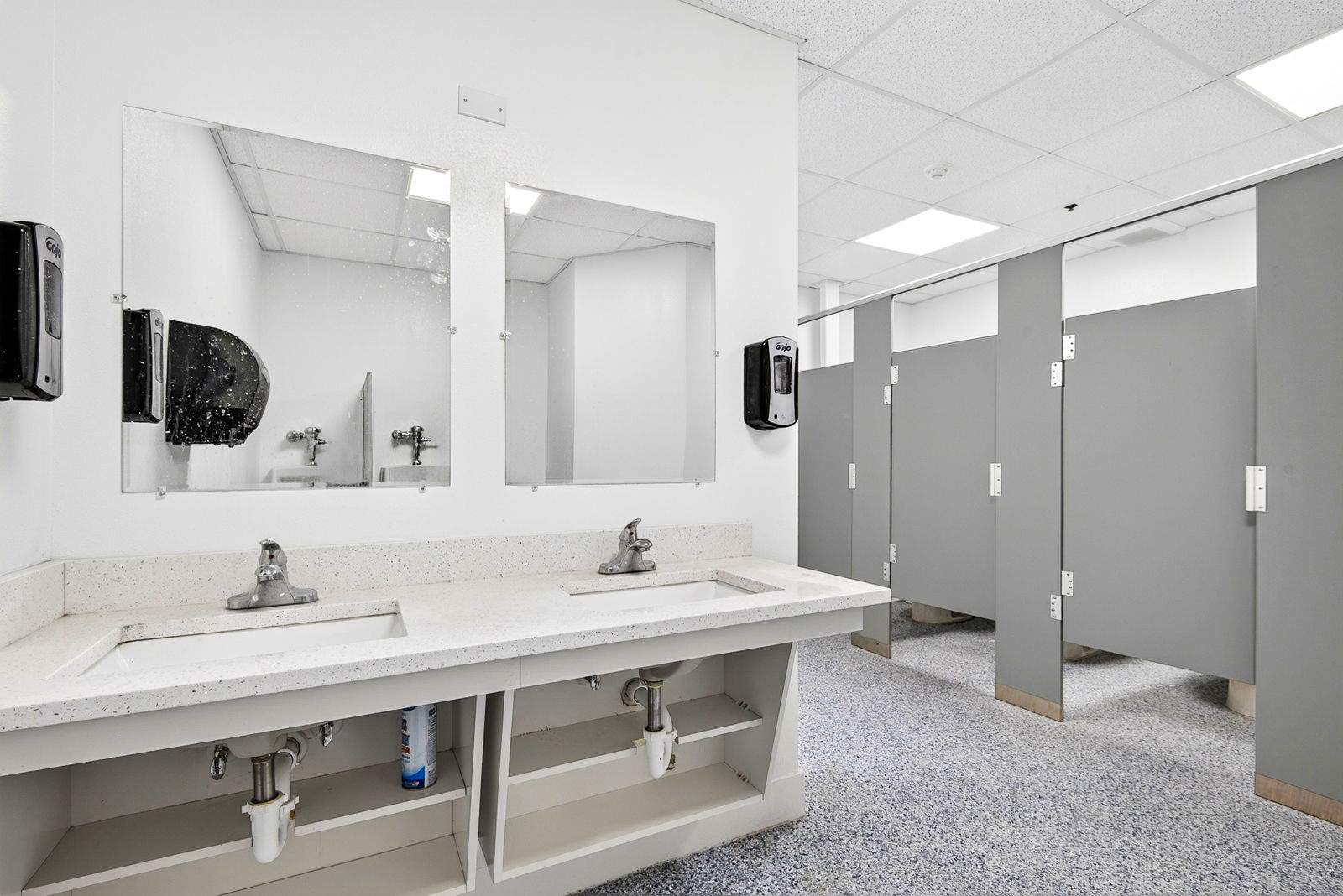 Commercial Restroom Renovation with Epoxy Flooring in Sarasota by Vertical General Contracting 