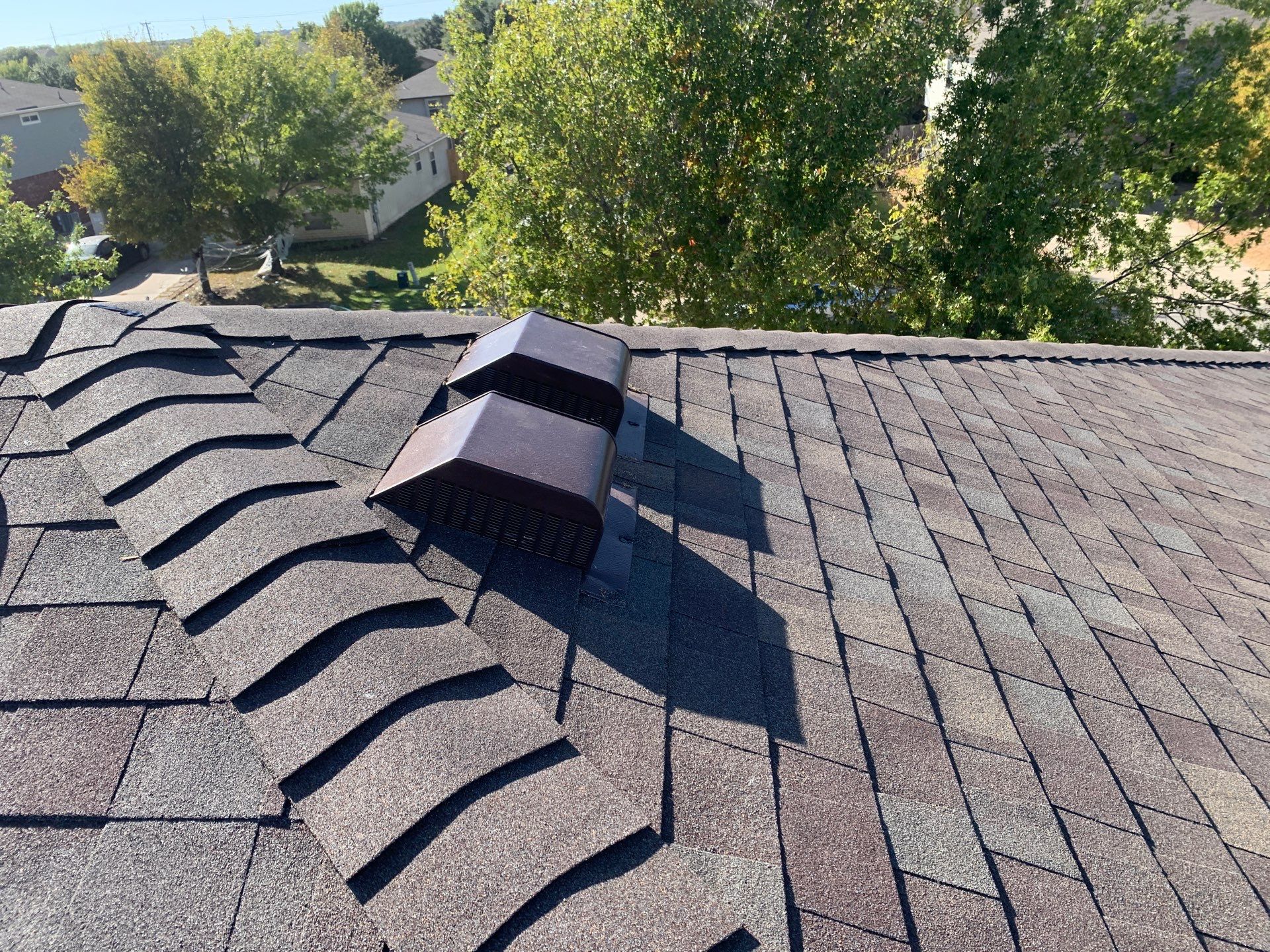 Asphalt Shingle Roof Replacement and Hail Damage Restoration in Hutto by Caliber Restoration LLC
