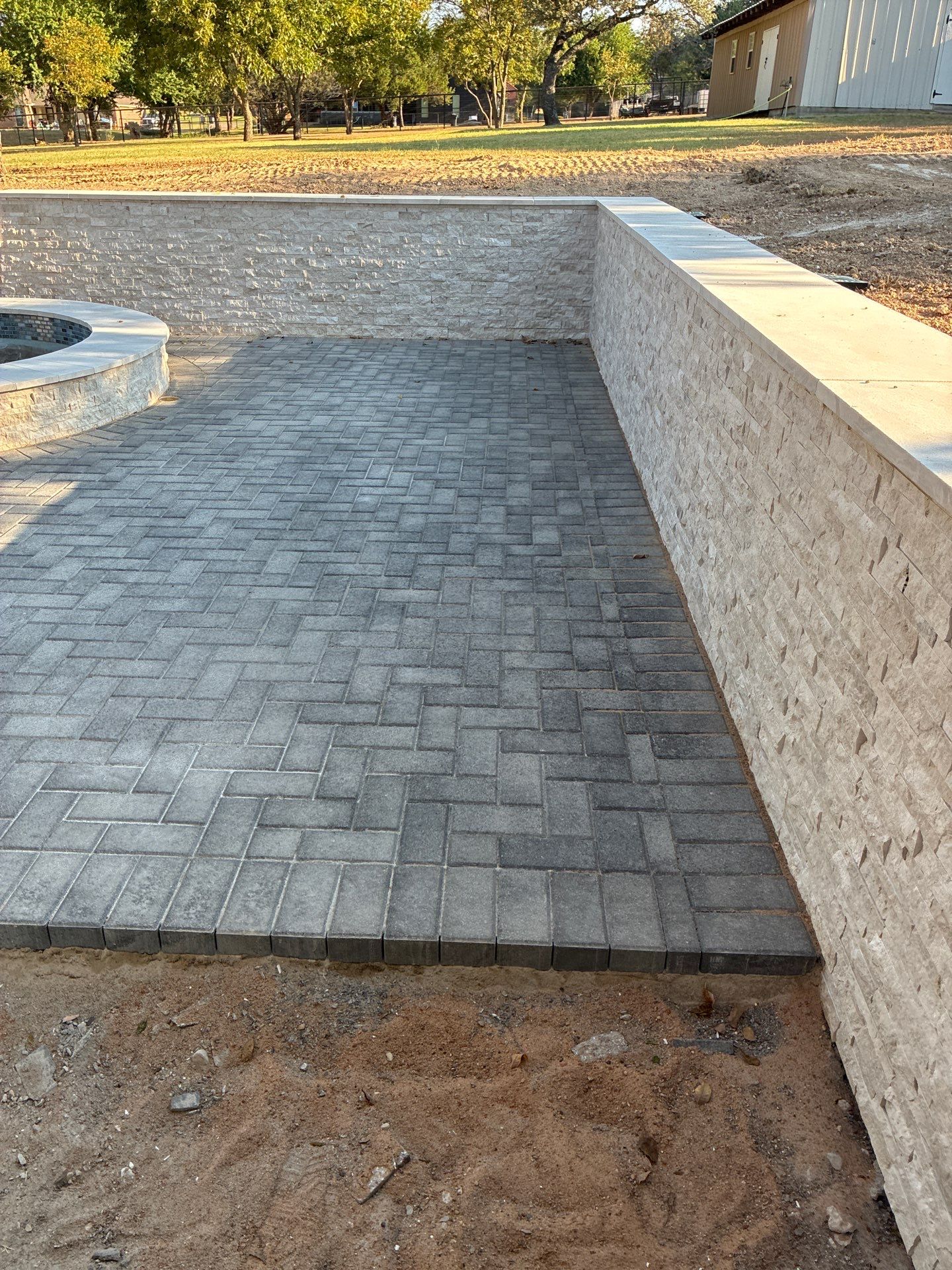 Geometric Pool with Raised Stone Spa by Pinnacle Pools and Spas - DFW