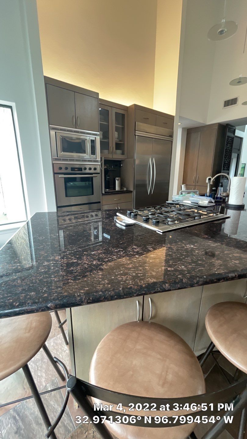 Modern & Clean Kitchen by SLM General Contractors & Roofing