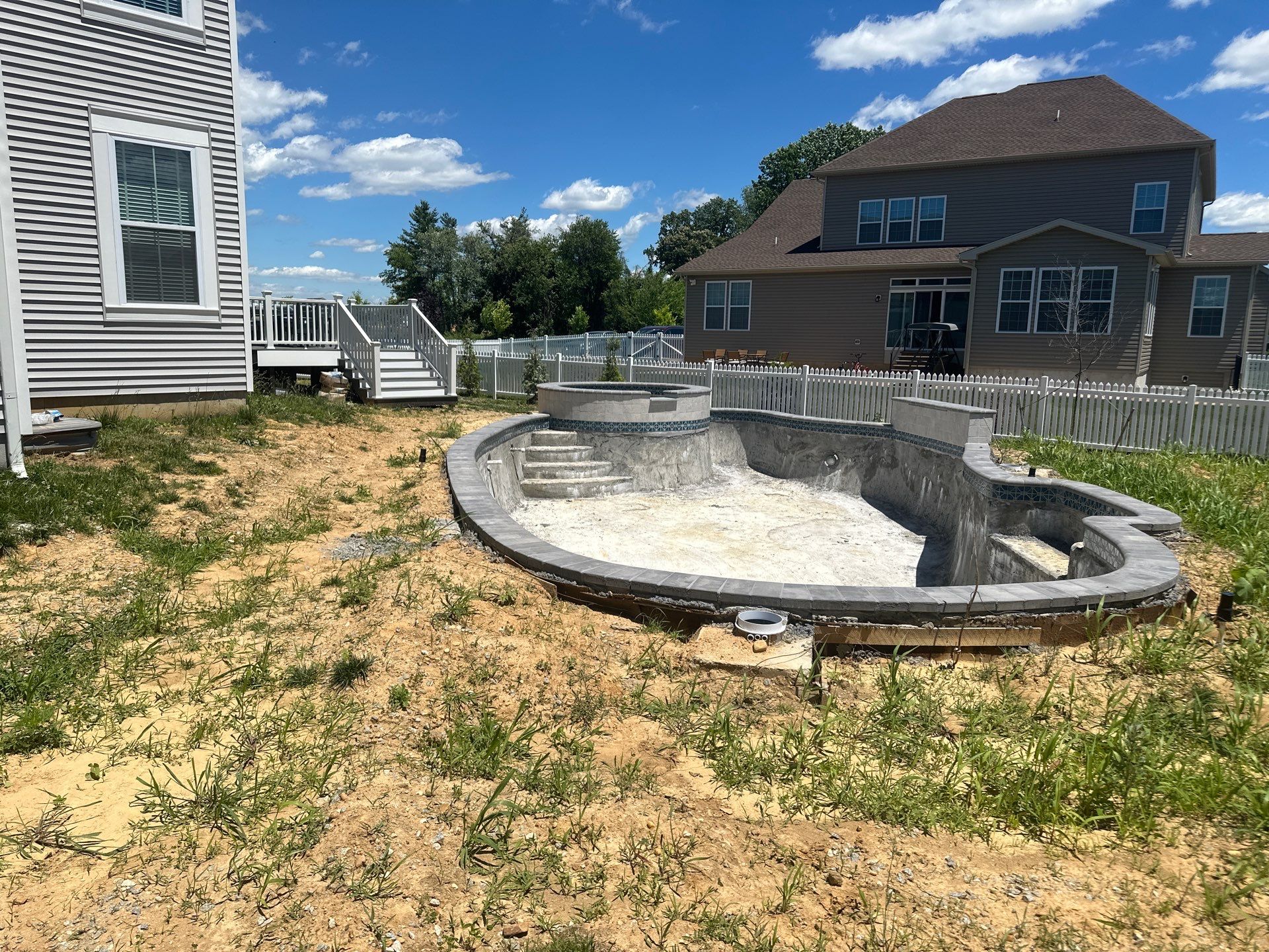 Pool and Hardscape Design in Delaware | Belgard Paver Patio & Outdoor Living Space by Studio G Indoor Spaces & Outdoor Living