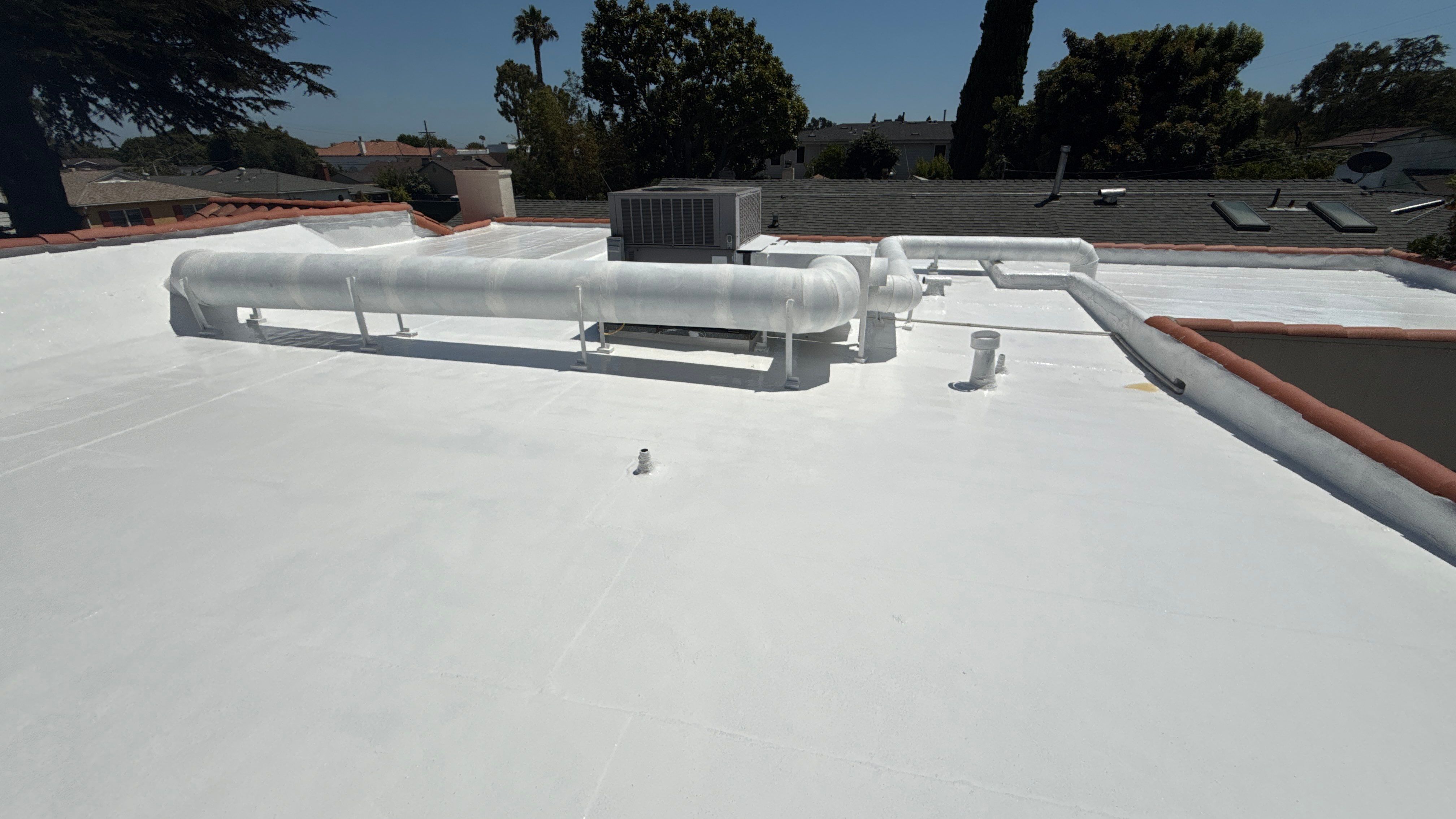 Tile Reset and Silicone Membrane Installation by Hull Brothers Roofing