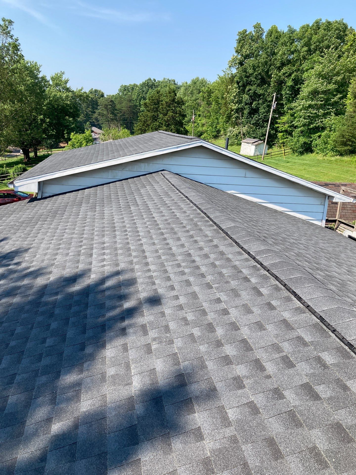 Residential Roofing Installation using GAF Timberline HDZ Charcoal by Rainstoppers Roofing