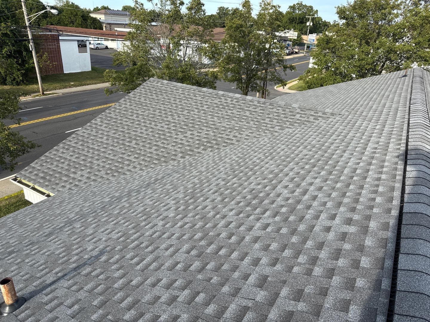 Santander Bank Roofing Project – New Shingles & TPO System by All Site Roofing