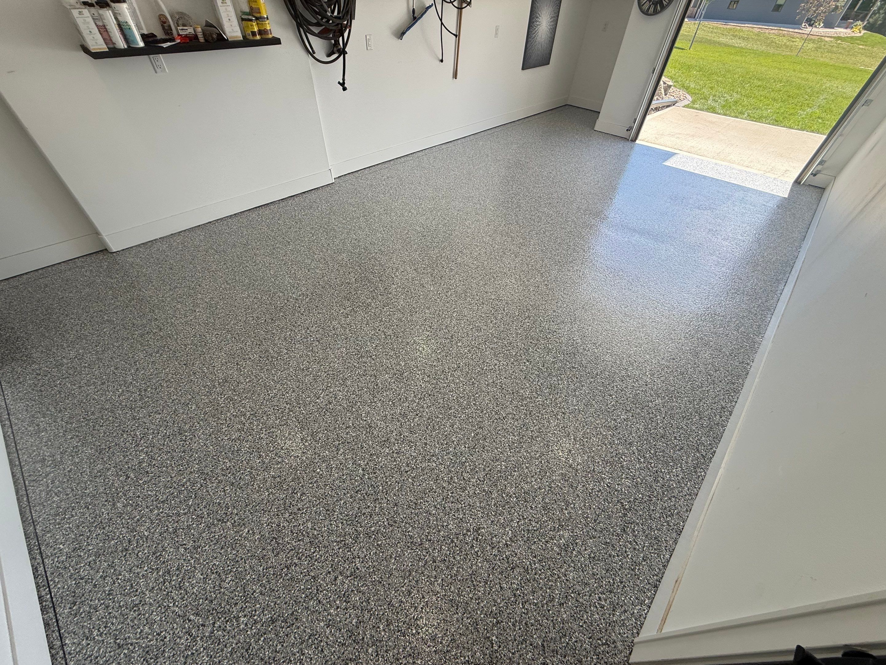 Gravel Flake Garage Floor Coating in Yankton by Select Painting, Coatings & Garage Cabinets
