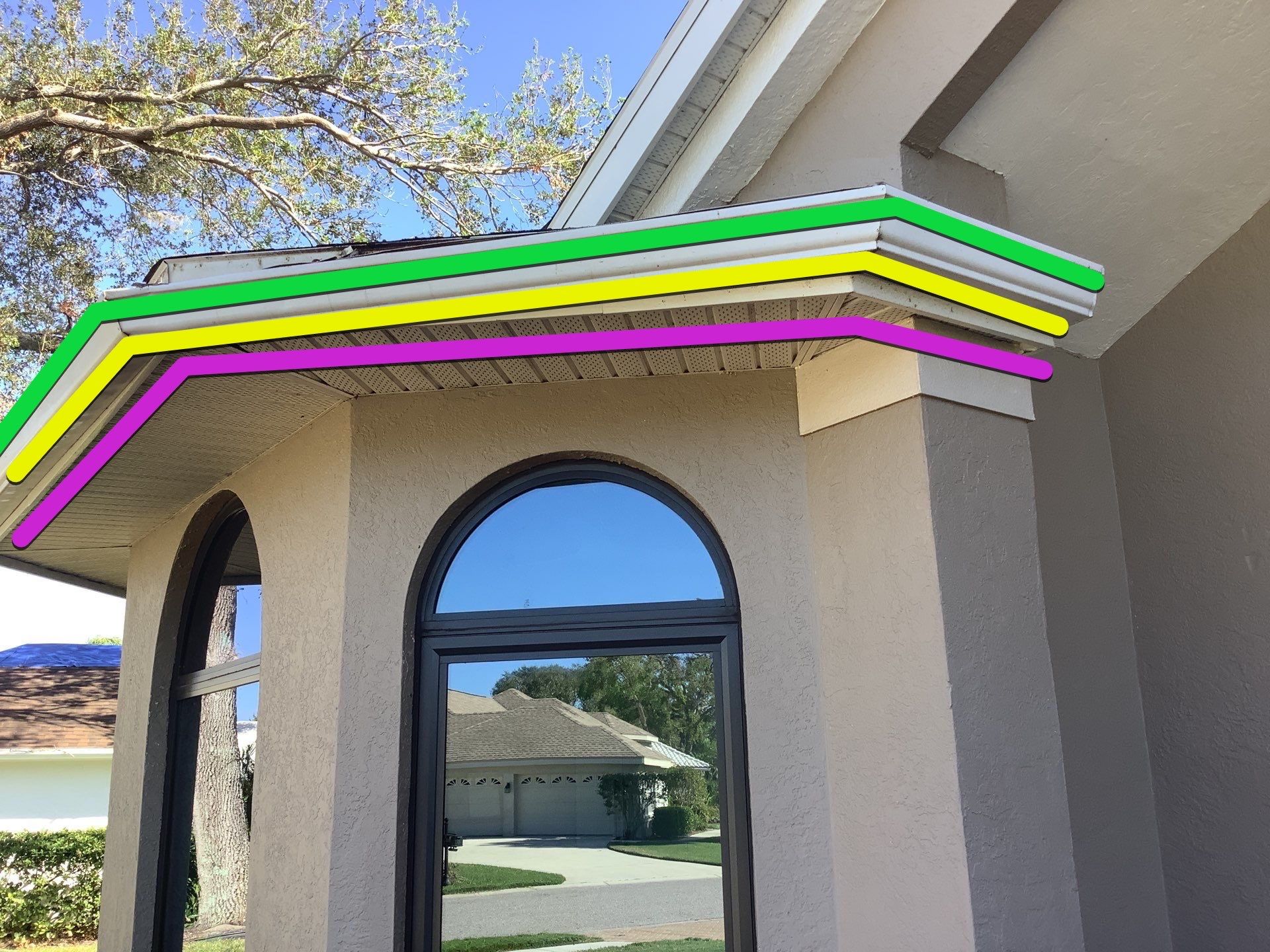 Black Seamless Gutters in Sarasota FL by Gutter Professors