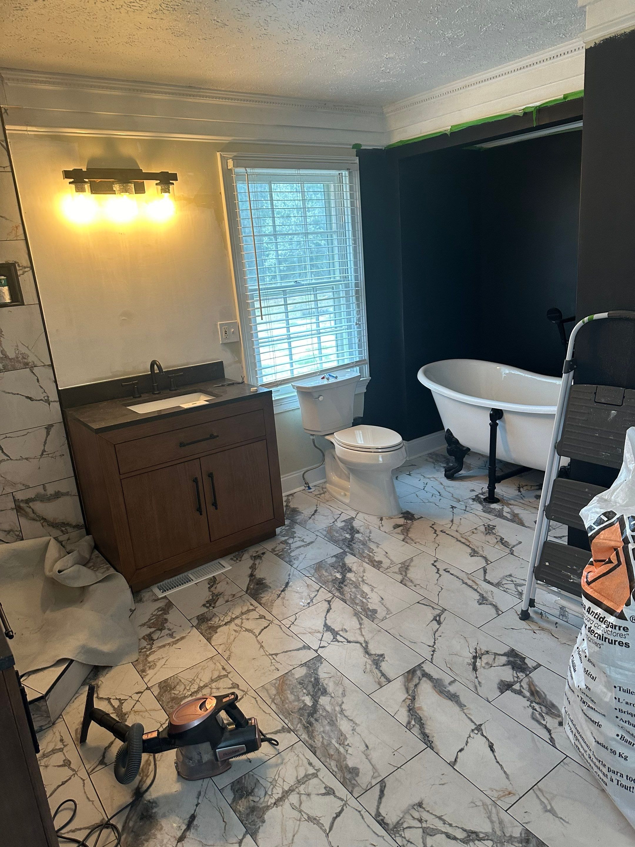 Bathroom Remodel using Soaker tub, vanities, tile, new shower by Baxter Professional LLC