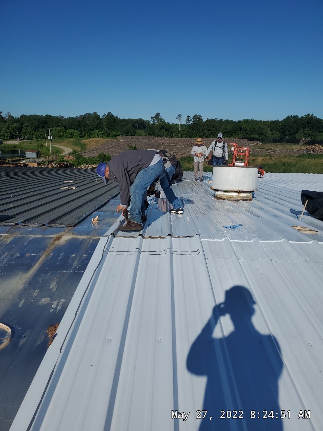 Commercial Roofing Installation using Aluminum Roofing panels by Hostetler Roofing