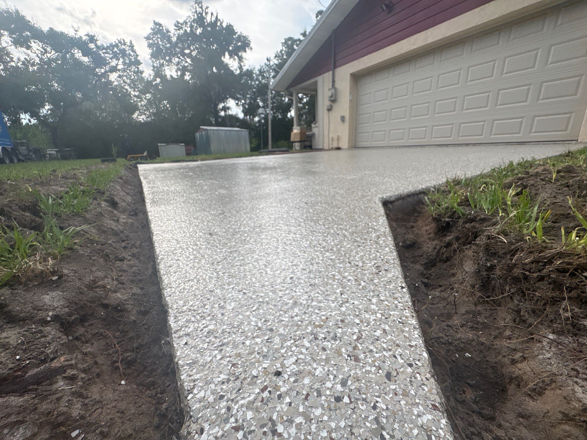Pool Deck and Driveway in Pebble Beach by Cross Creek Concrete Coatings