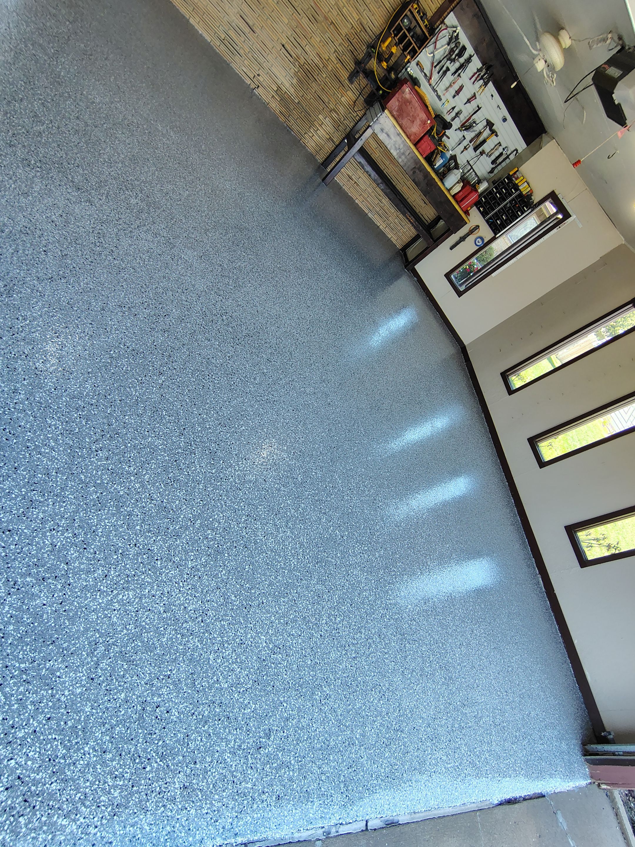 Garage Floor Coating with Crack Repair in Yankton by Select Painting, Coatings & Garage Cabinets