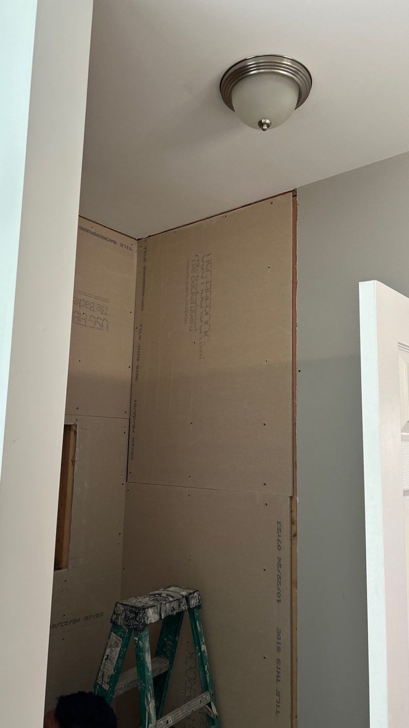 Tile shower remodel and heated floors by Footprints Floors of Nashville