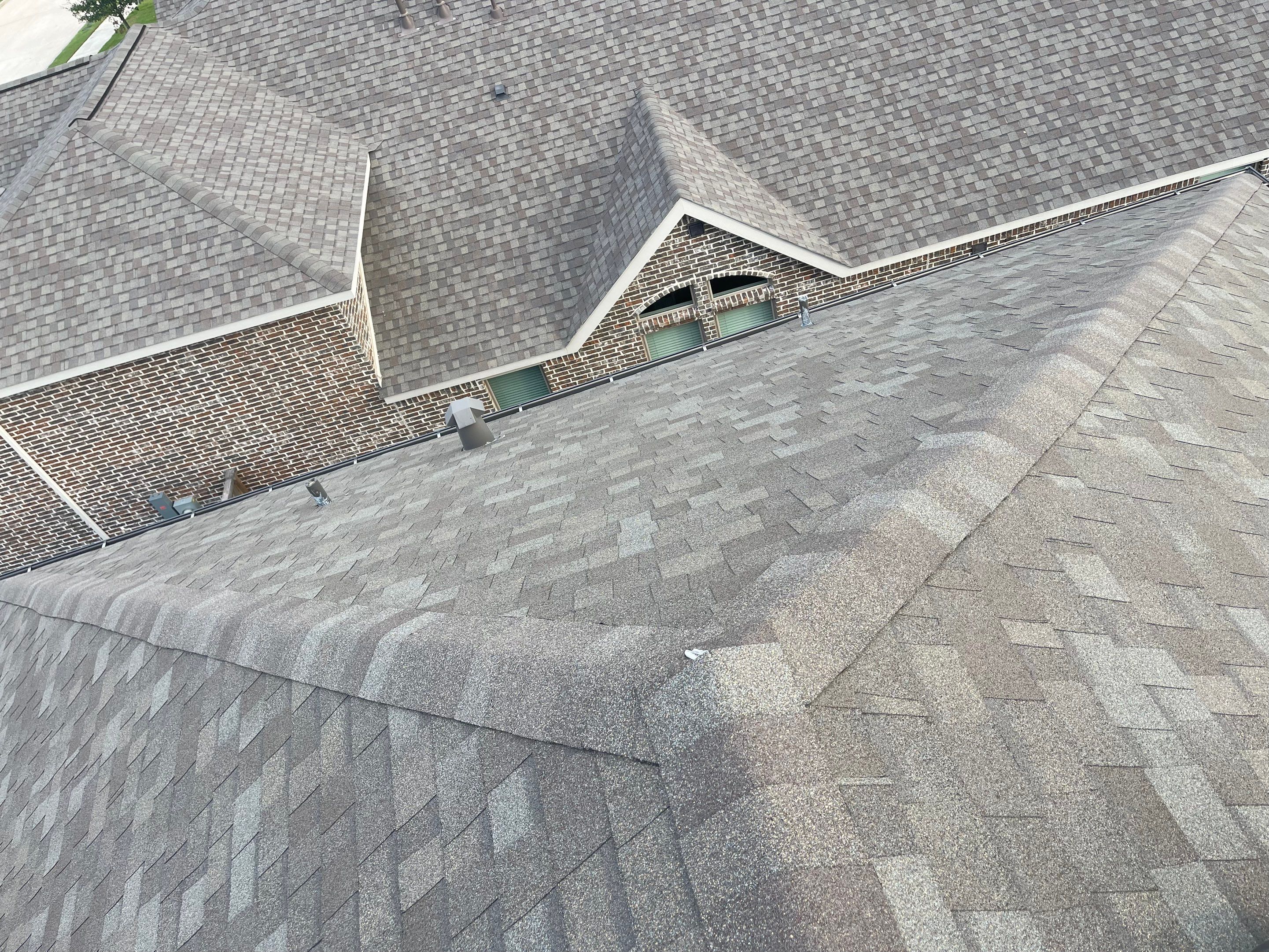 Hail Damage using Owen's Corning Duration (Lifetime) Shingles by Roof Repair Company