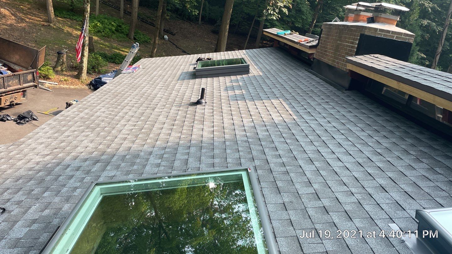 Deckhouse Roof Replacement by American Home Contractors