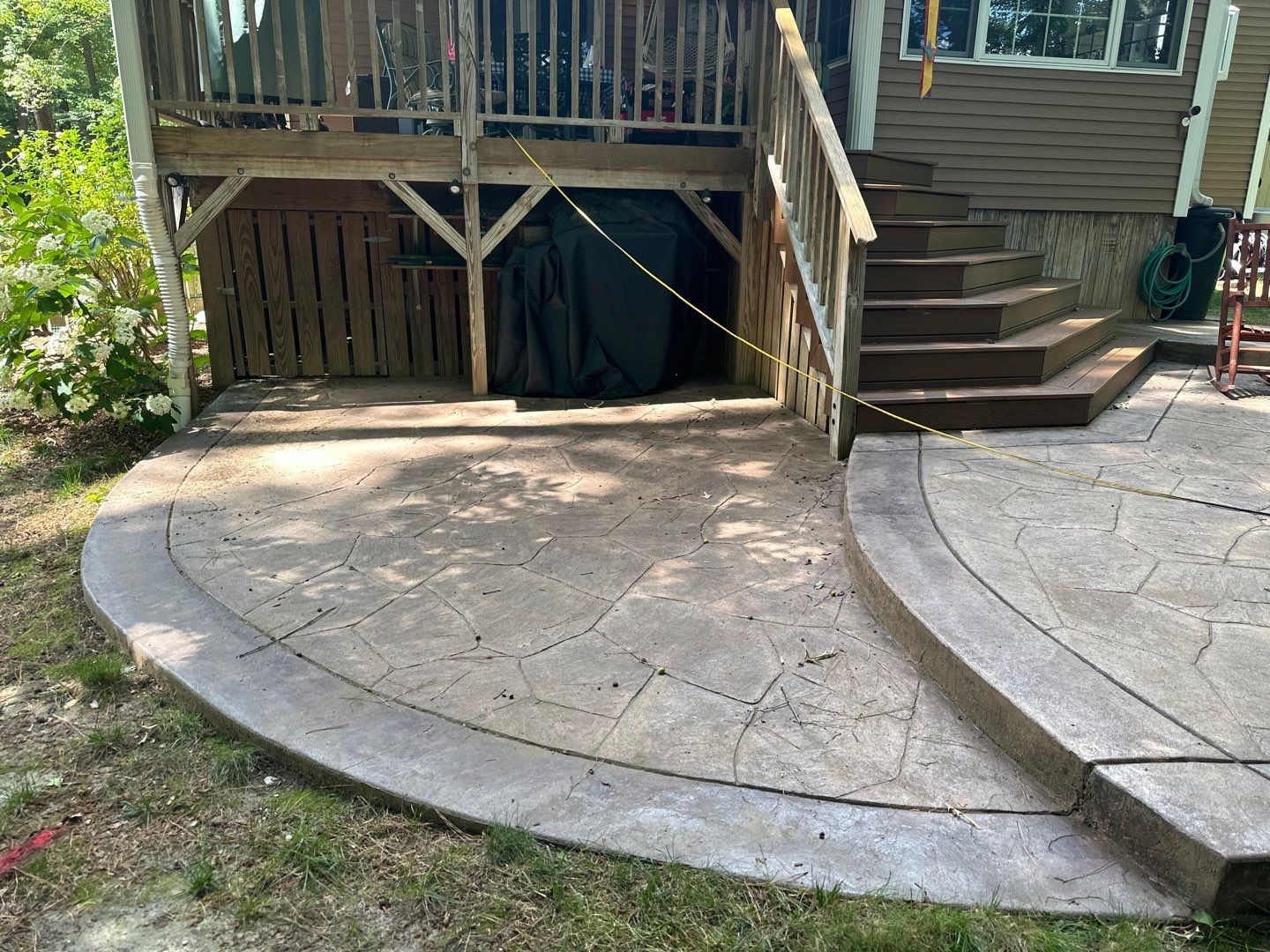 Stamped Concrete and Weathered Deck by DuraSeal