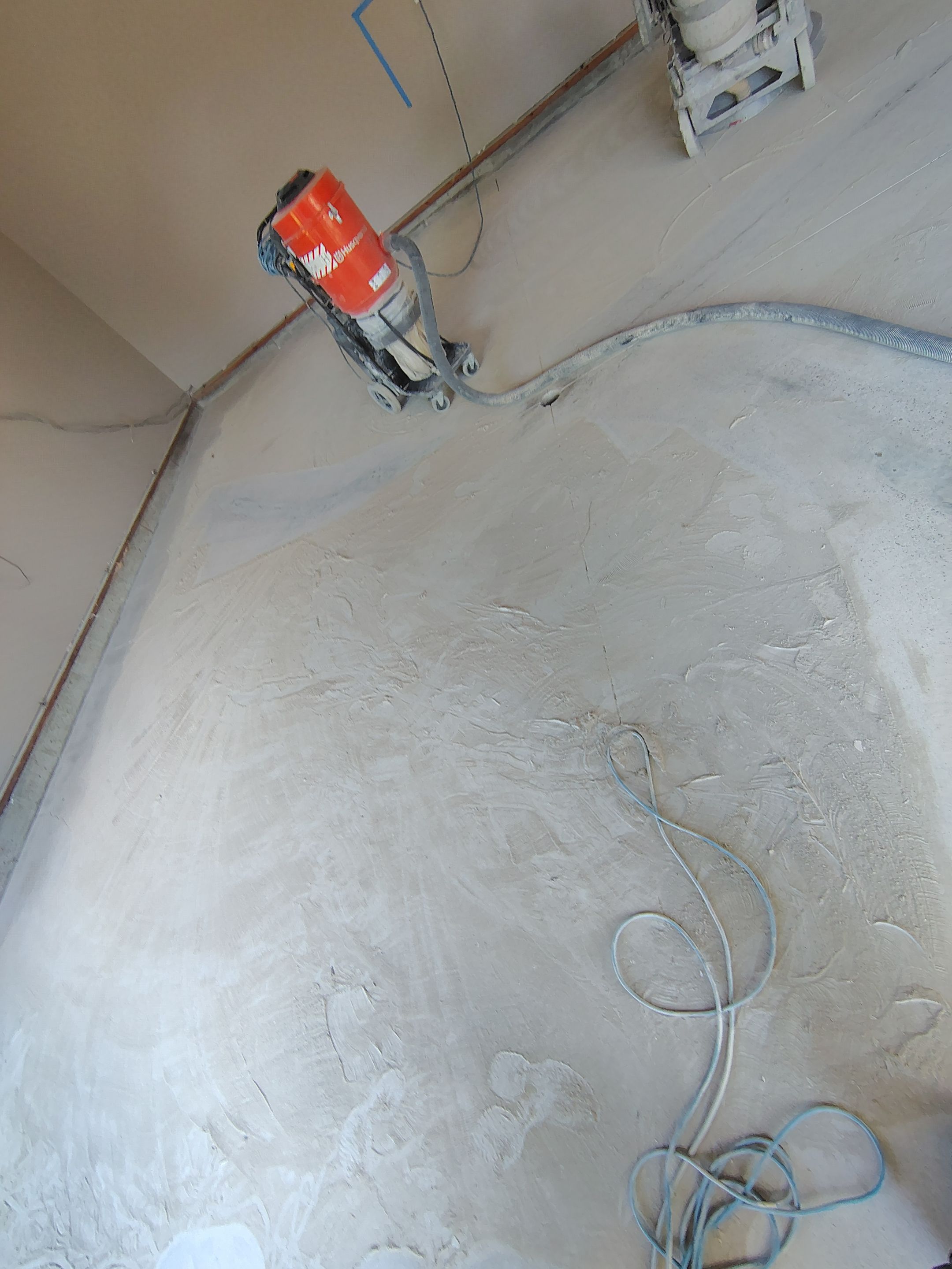 Sioux Falls Garage Concrete Repair and Epoxy Flake Floor Coating by Select Painting, Coatings & Garage Cabinets