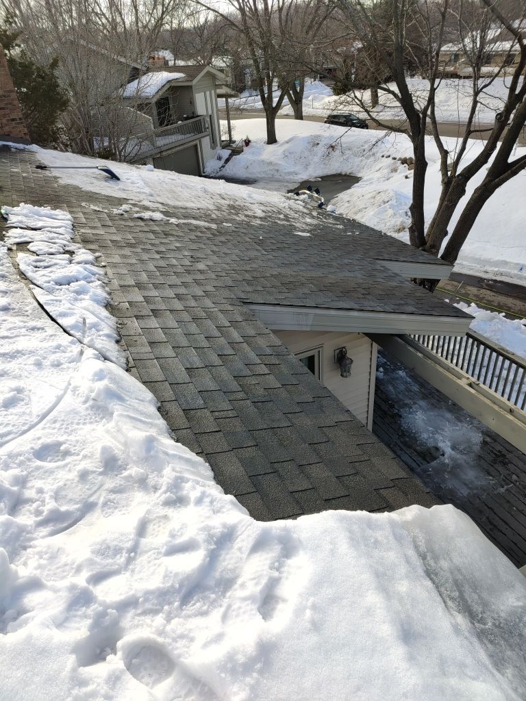 Ice Dam Removal in Eden Prairie by Next Level Seamless Gutters / Exteriors Inc.