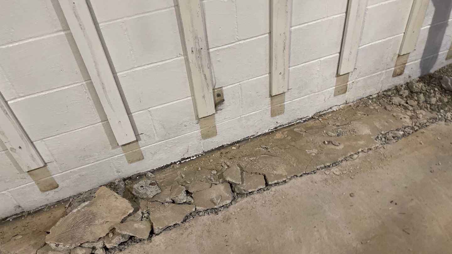 Interior Drain Tile & Buried Discharge in St. Anthony, MN by Waterproofing Northeast