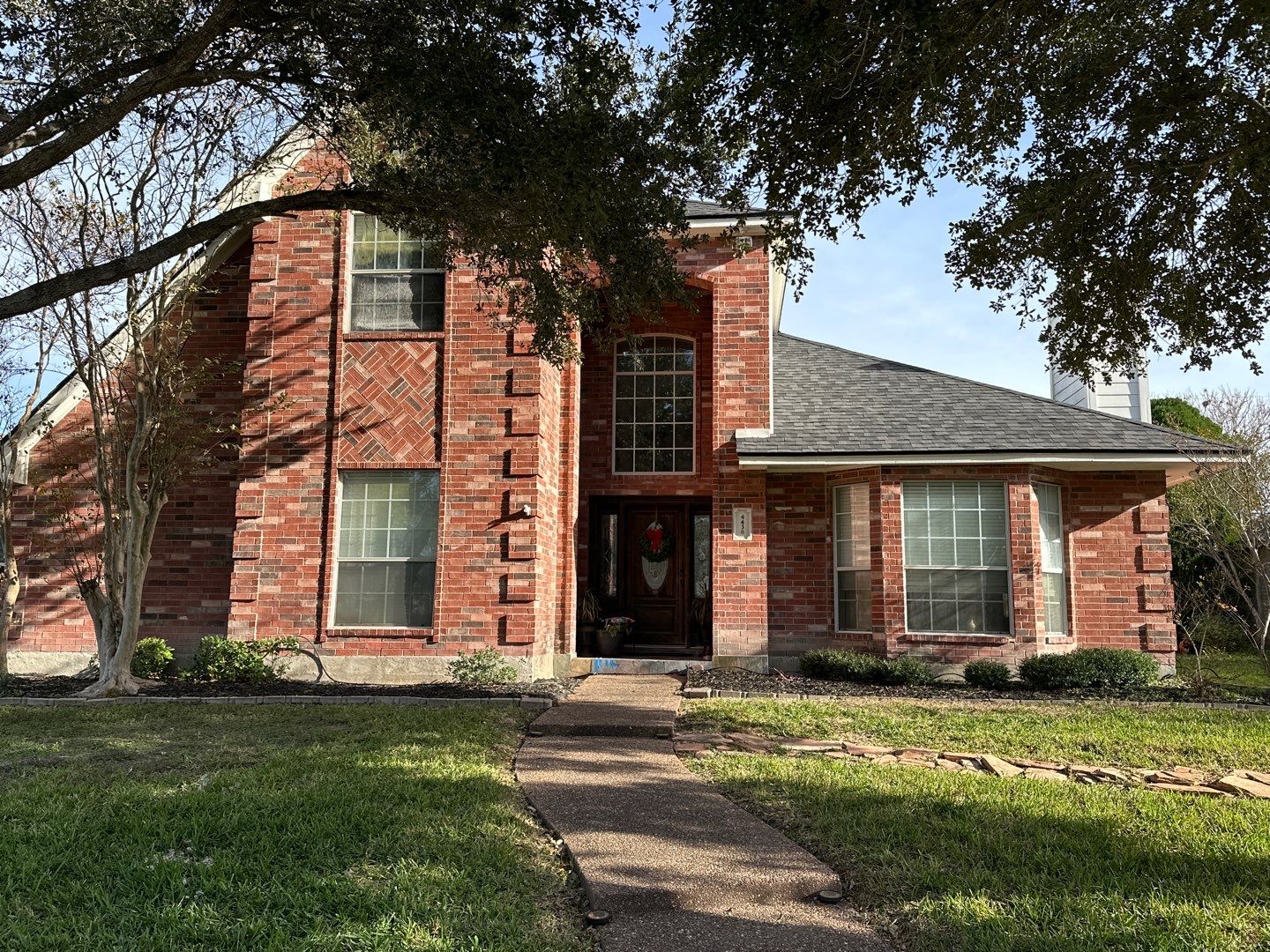 Residential Roofing Installation using Certainteed Landmark Moire Black by Galvan Roofing and Construction