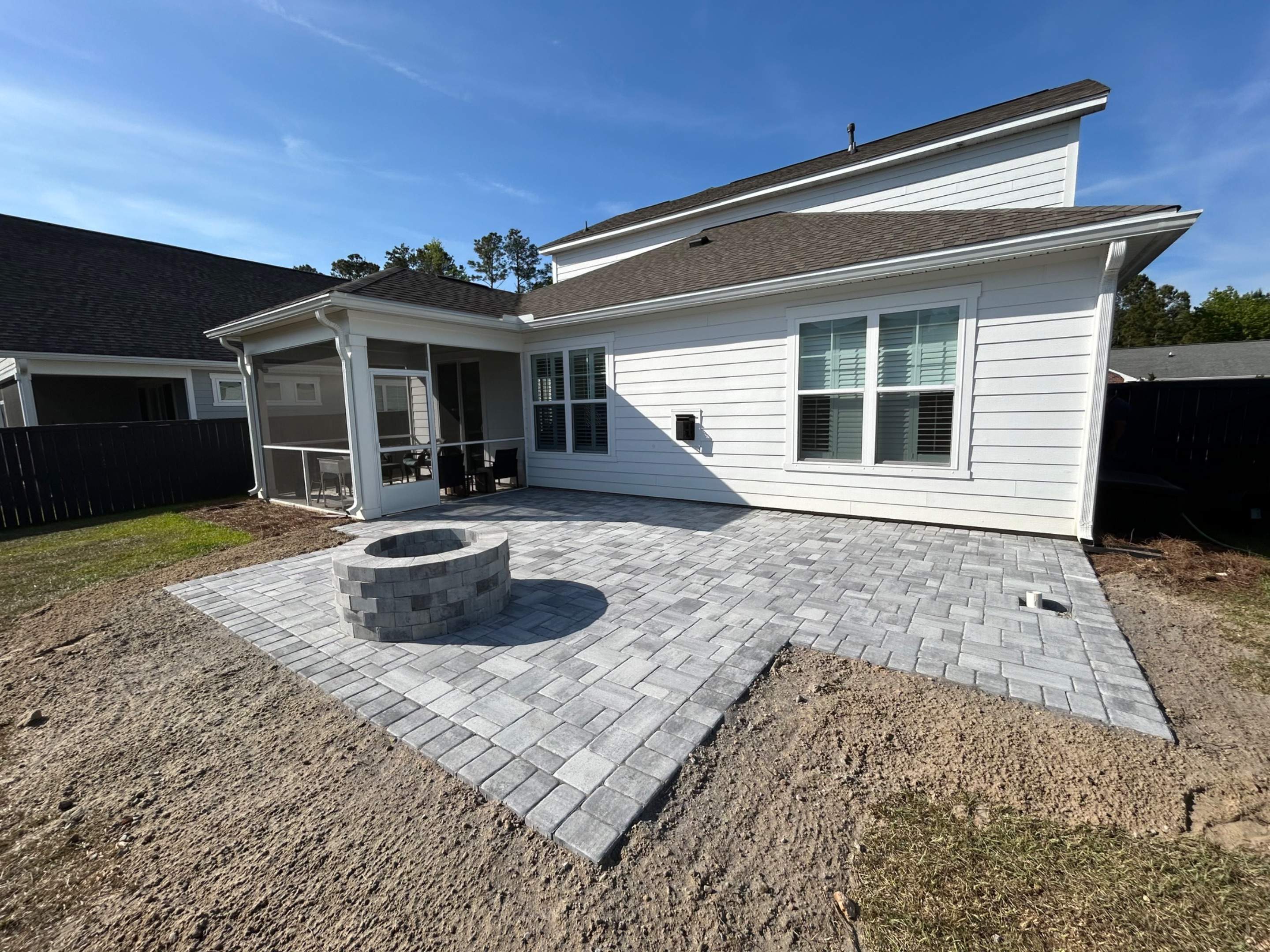 Custom Paver Patio and Stone Fire Pit Installation in Mt Pleasant by Lowcountry Scapes, LLC