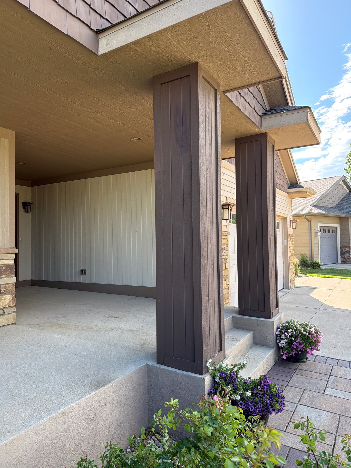 Sioux Falls Exterior Refresh and Multi-Level Deck Maintenance by Select Painting, Coatings & Garage Cabinets