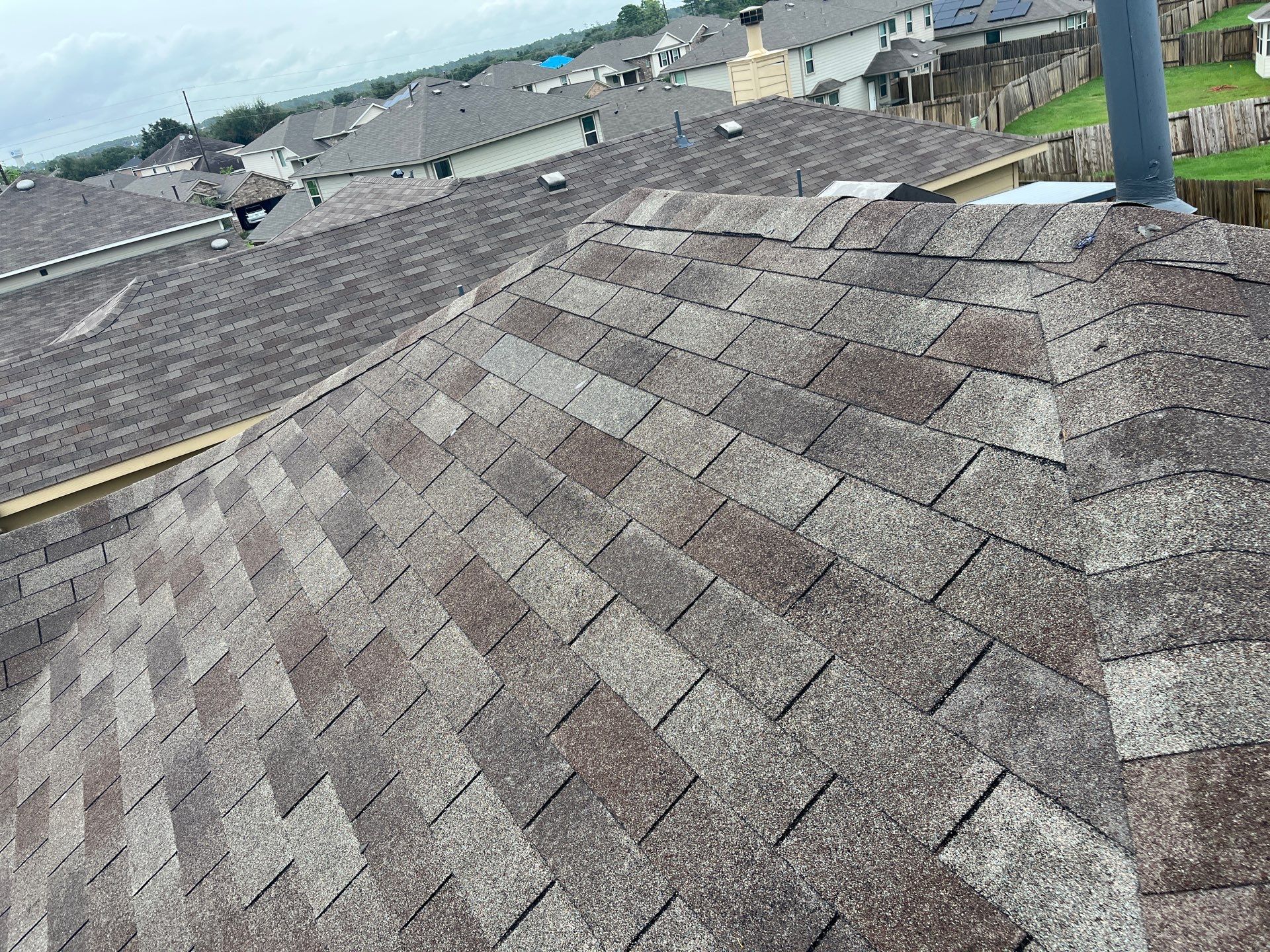Hail Damage using Owen's Corning Duration (Lifetime) Shingles by Roof Repair Company