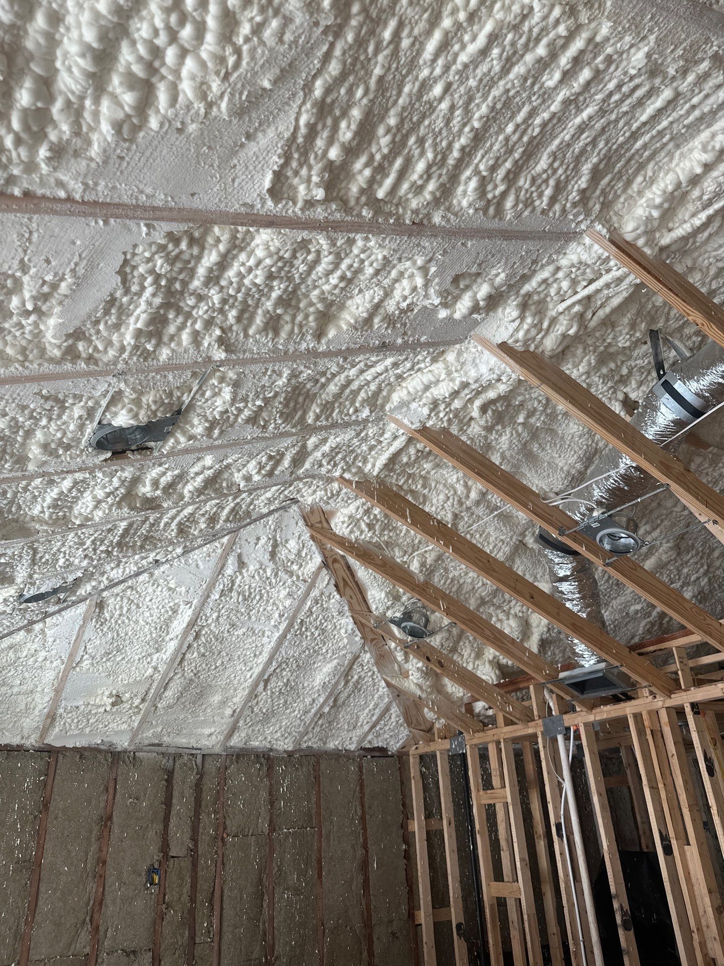 Open cell spray foam & rockwool job completed in Dallas TX by Apex Insulation Solutions