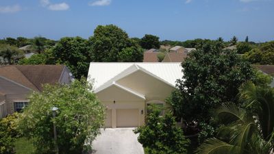 Residential Roofing Installation using 1.5'' Mechanical Seam