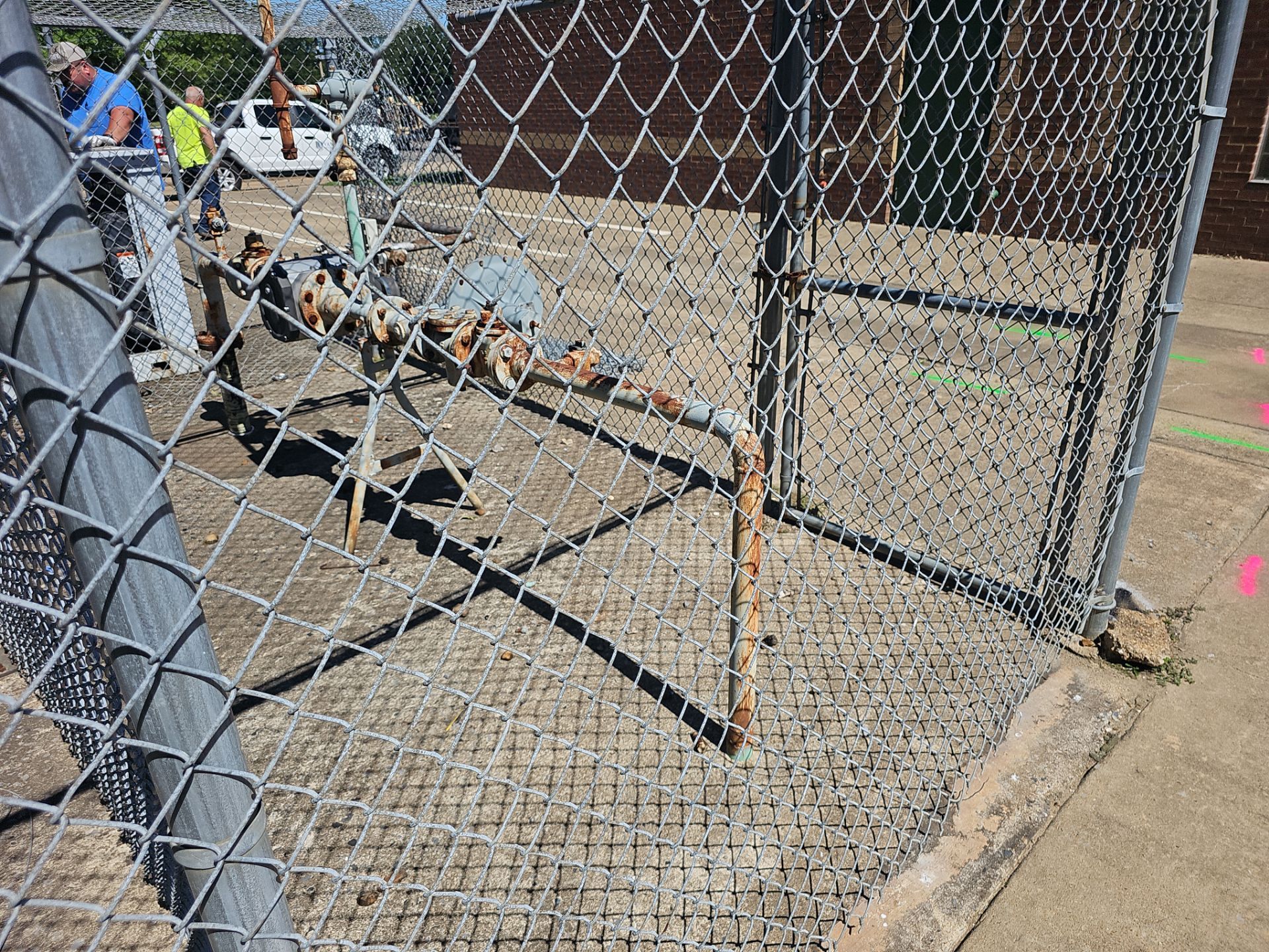 Utility Locating at a school for fence install by Alsip Locating Service, LLC