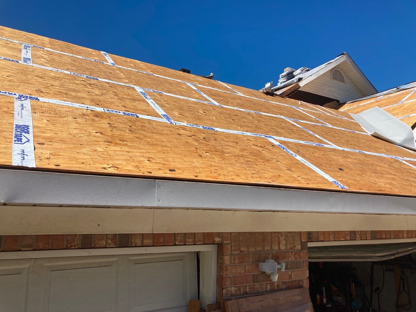 Residential Roofing Installation using Roof Replacement by American Roofing & Construction LLC
