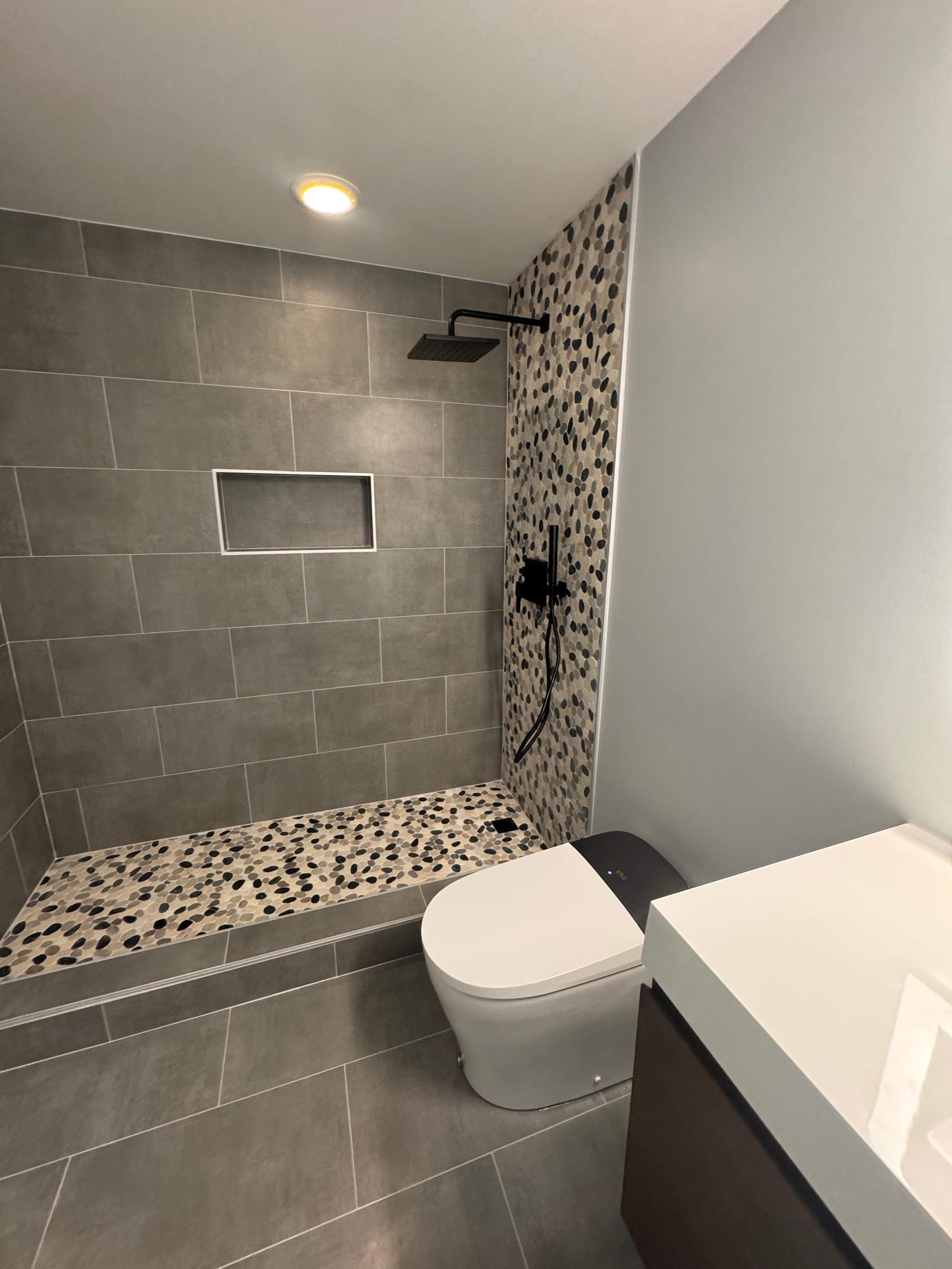 Basement bathroom renovation by Prudencio