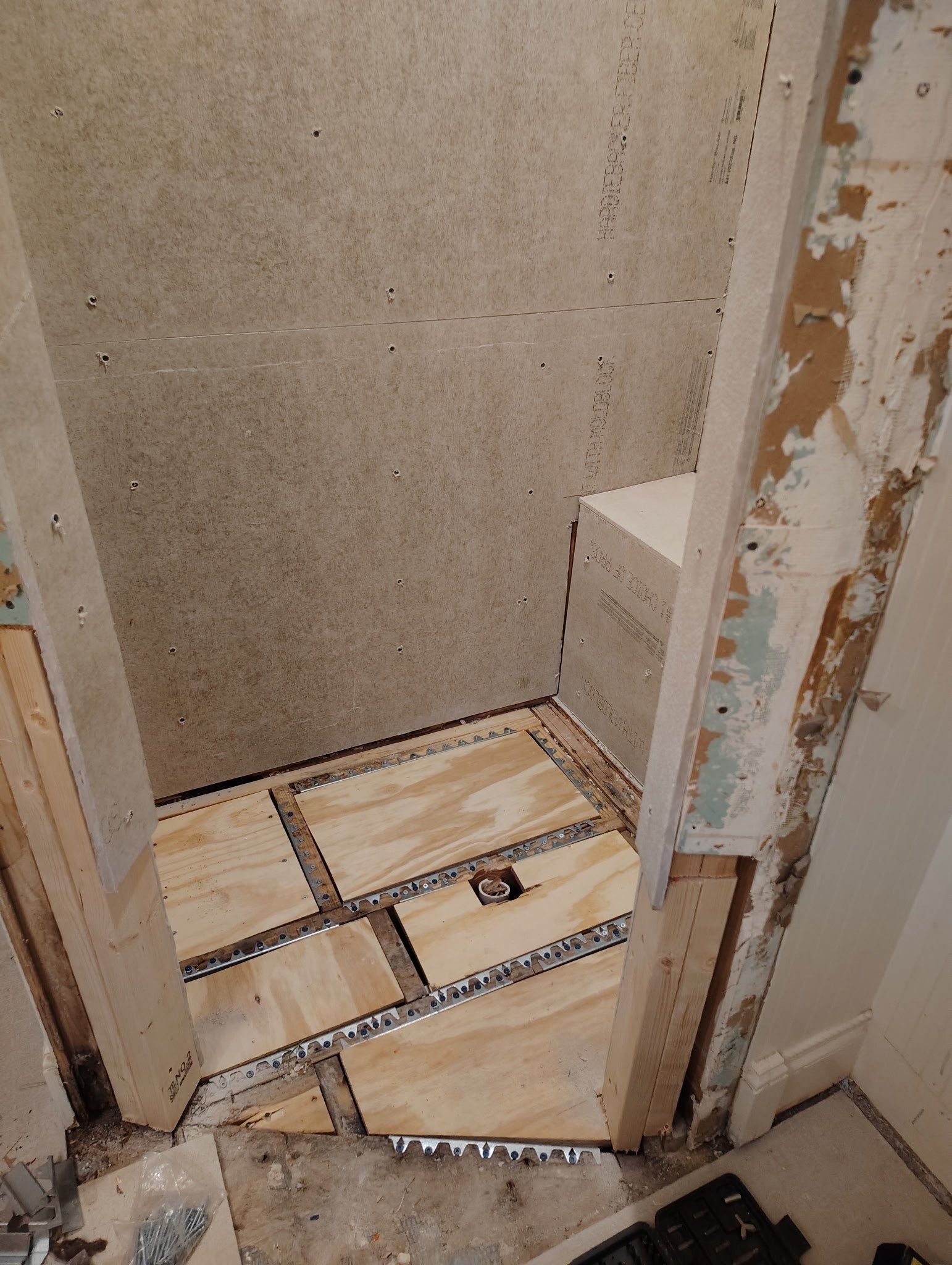 Tile shower and floor by Footprints Floors of Nashville