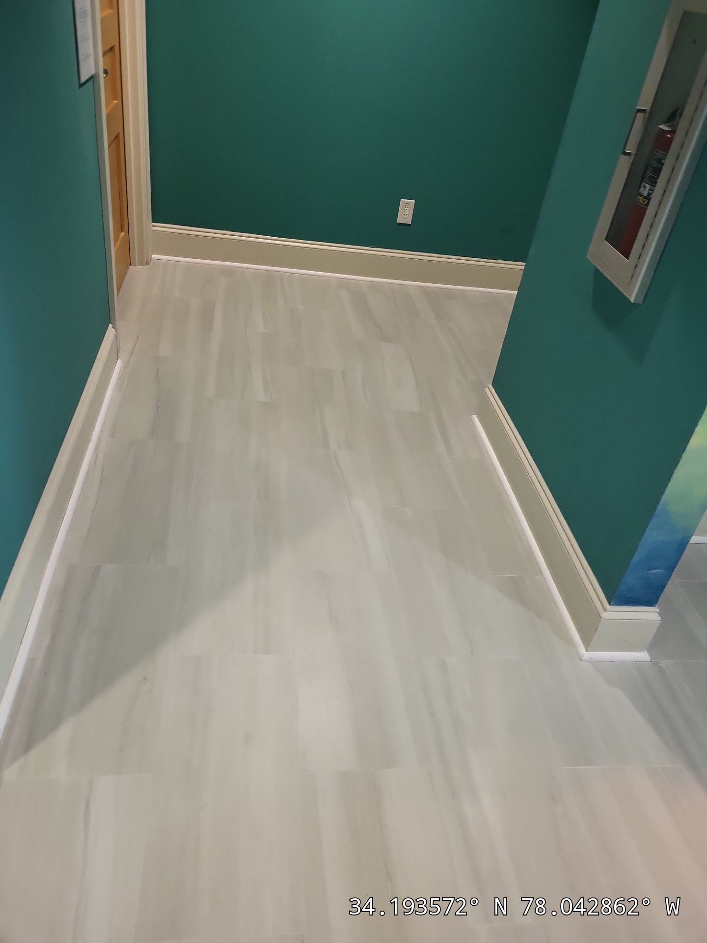 Commercial Fitness Center Flooring Installation & Cabinet Installation  by RGR Construction and Roofing, LLC