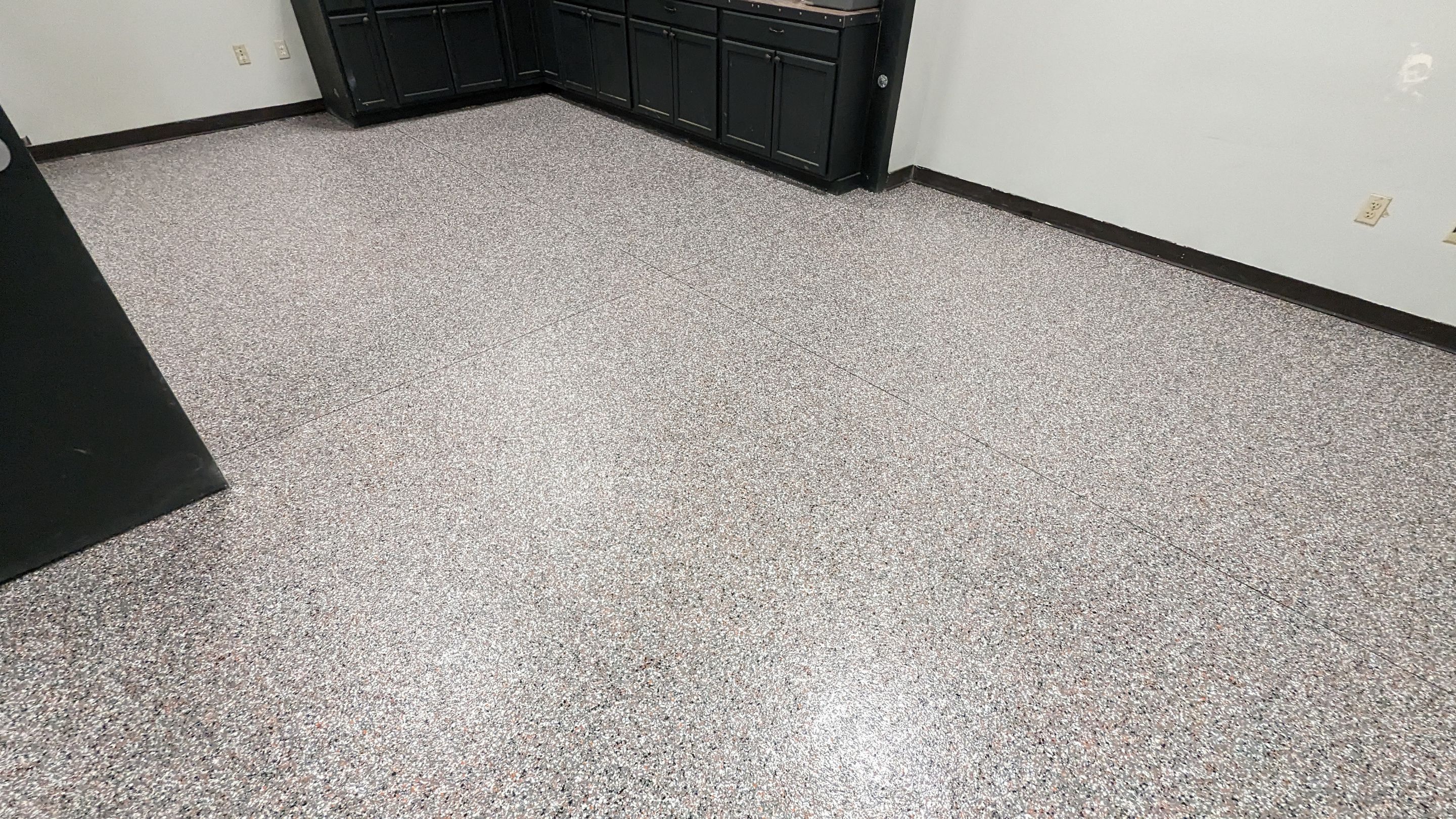 Equipment Share Commercial Floor Transformation using Smoke w/ 5% Orange by Croc Coatings, LLC