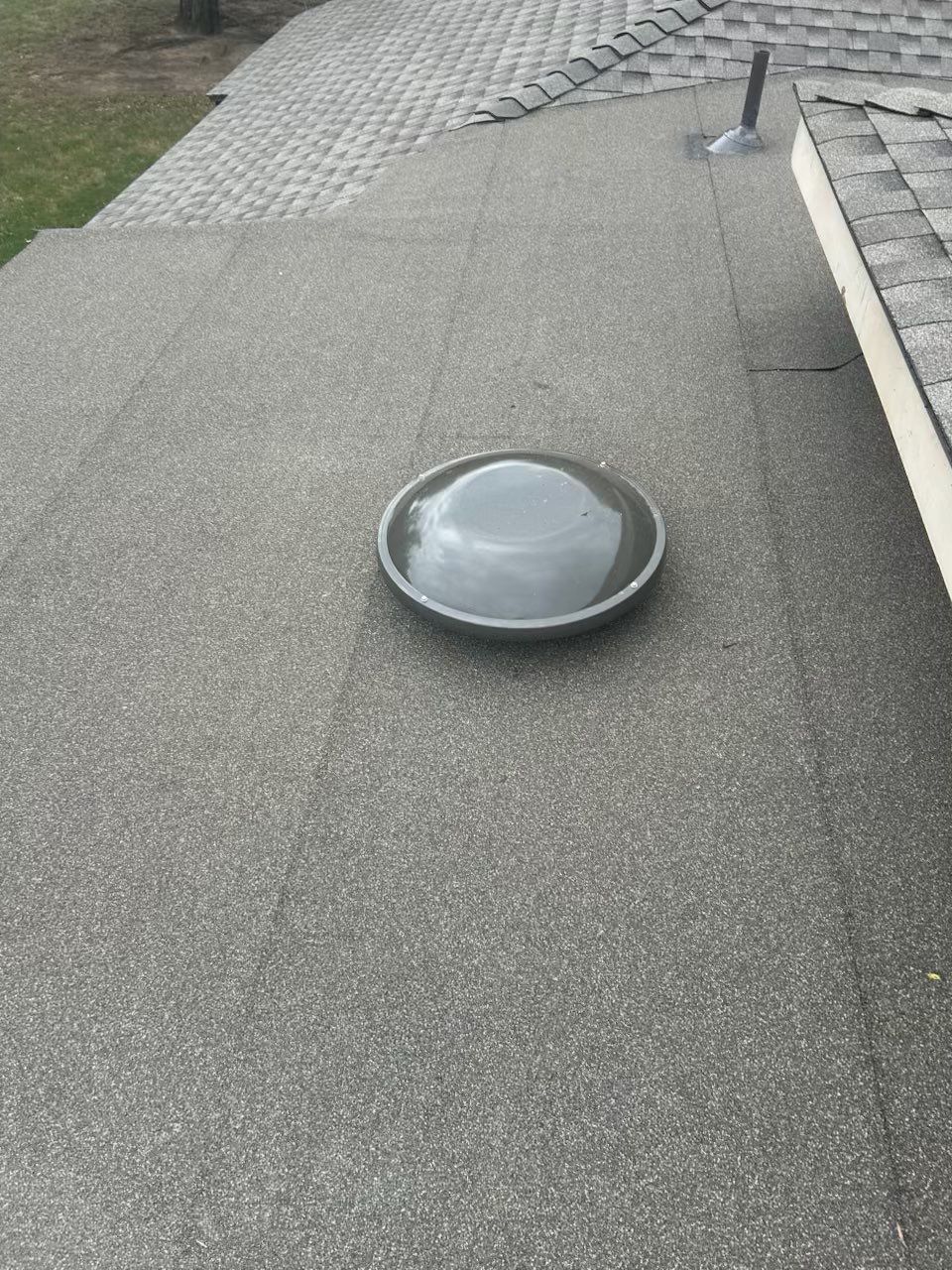 roof replacement, chimney flashing repair, and skylight replacement in Oklahoma City by McCann's Roofing and Construction