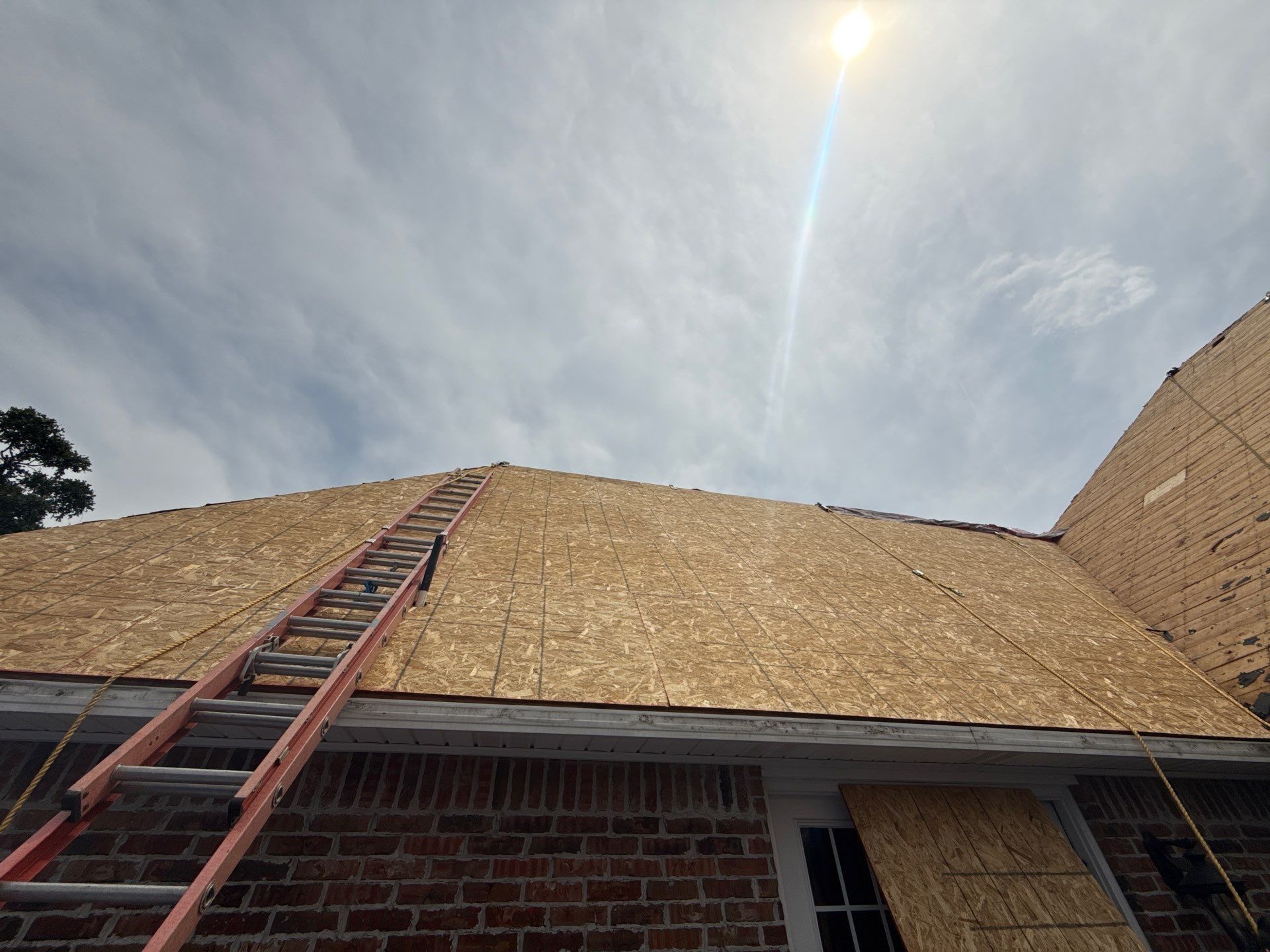 Roof replacement w/code upgrades all paid by Insurance. by In & Out Construction & Remodeling, LLC