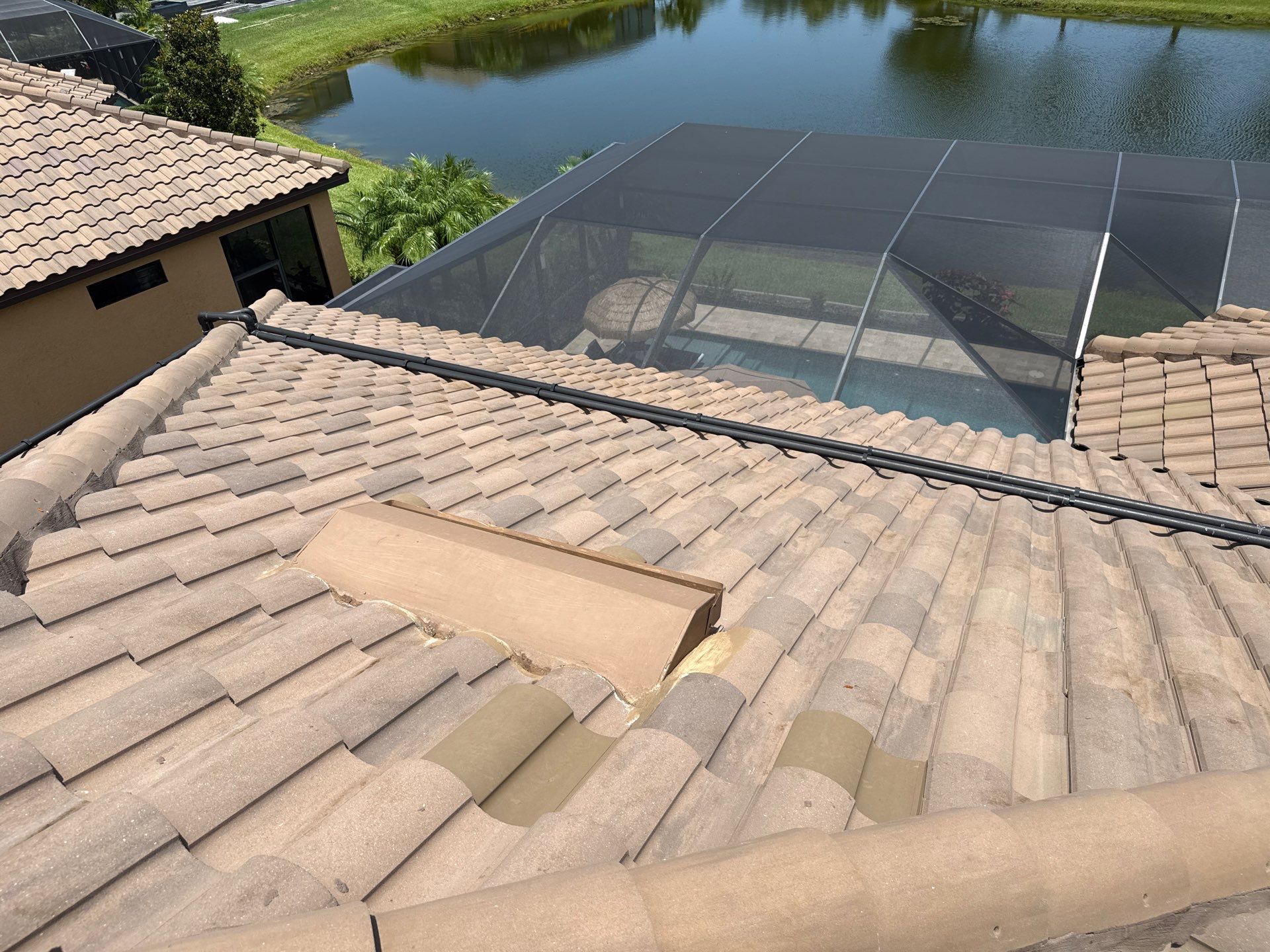 Neighboring Tile Roof Cleaning with Gutter Runoff Control – Palmetto, FL by Sunshine AquaWash