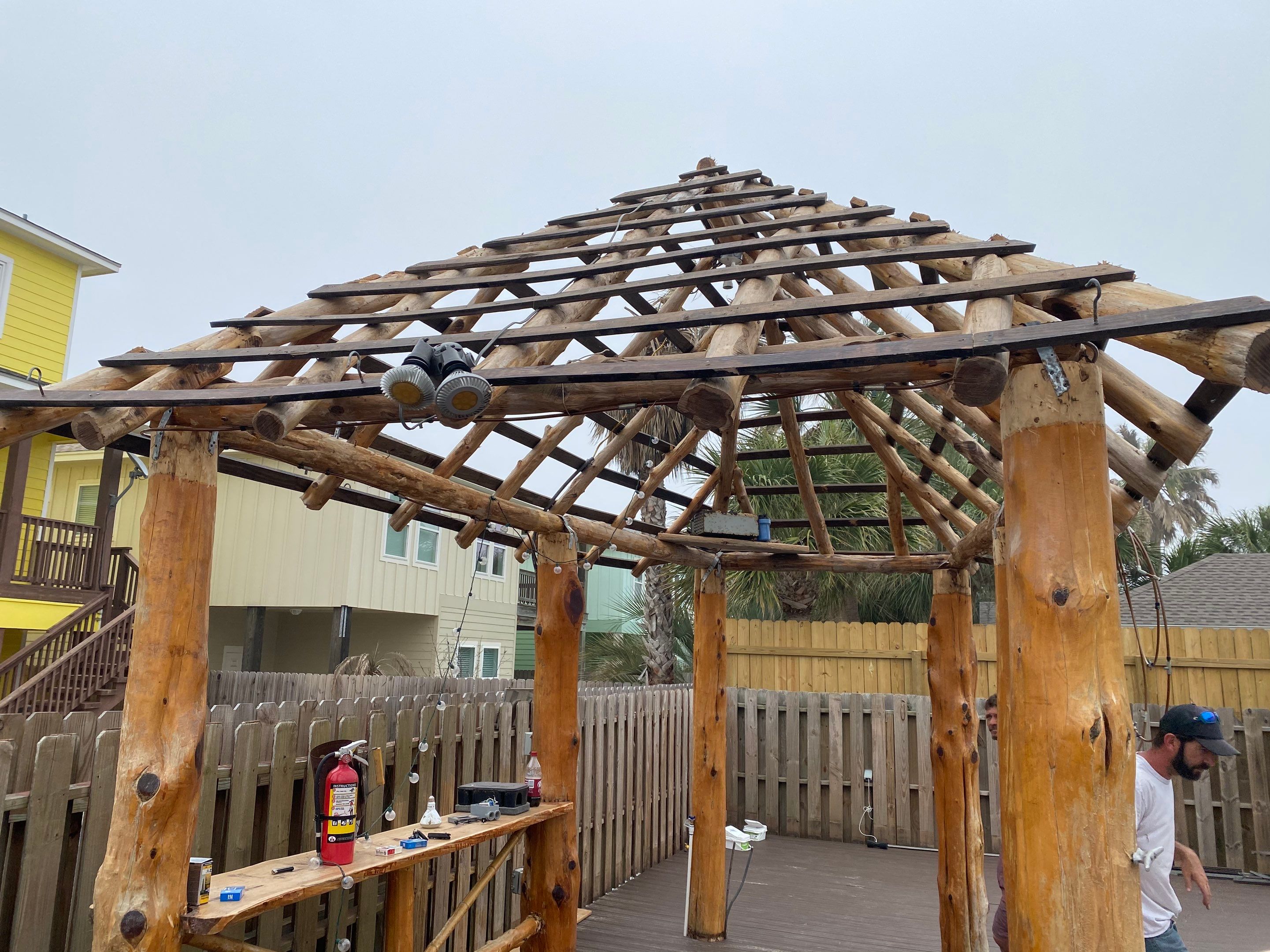 Poolside paradise by Bayfront Roofing and Construction