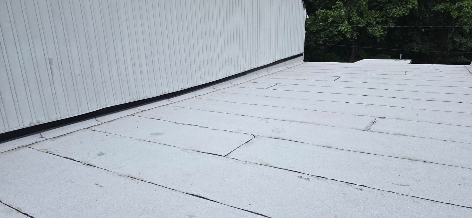 Roof Installation using Silicone APP Elevate Coating by ExteriorPros