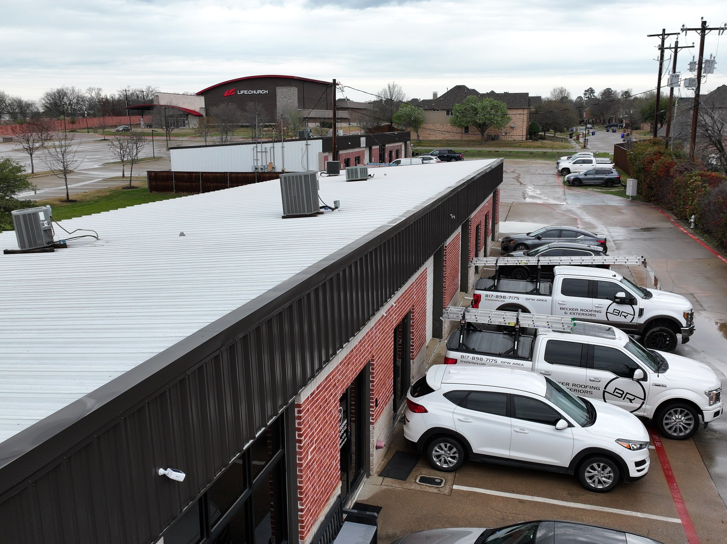 Commercial Roofing Installation using Double lock Mechanical Standing Seam Metal by Becker Roofing and Exteriors