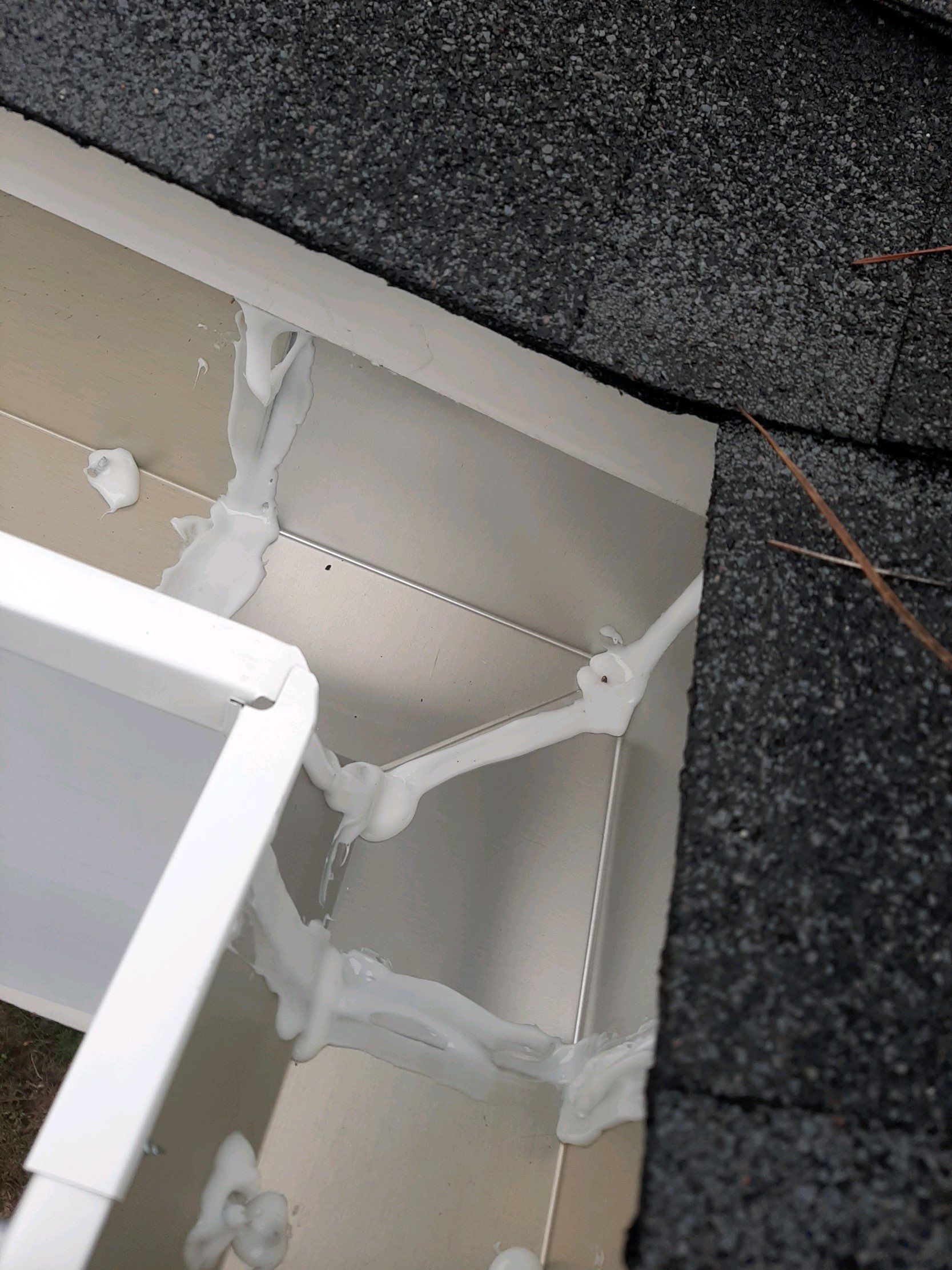 Gutter Installation using White K-Style Seamless Gutters by Gutter Professors