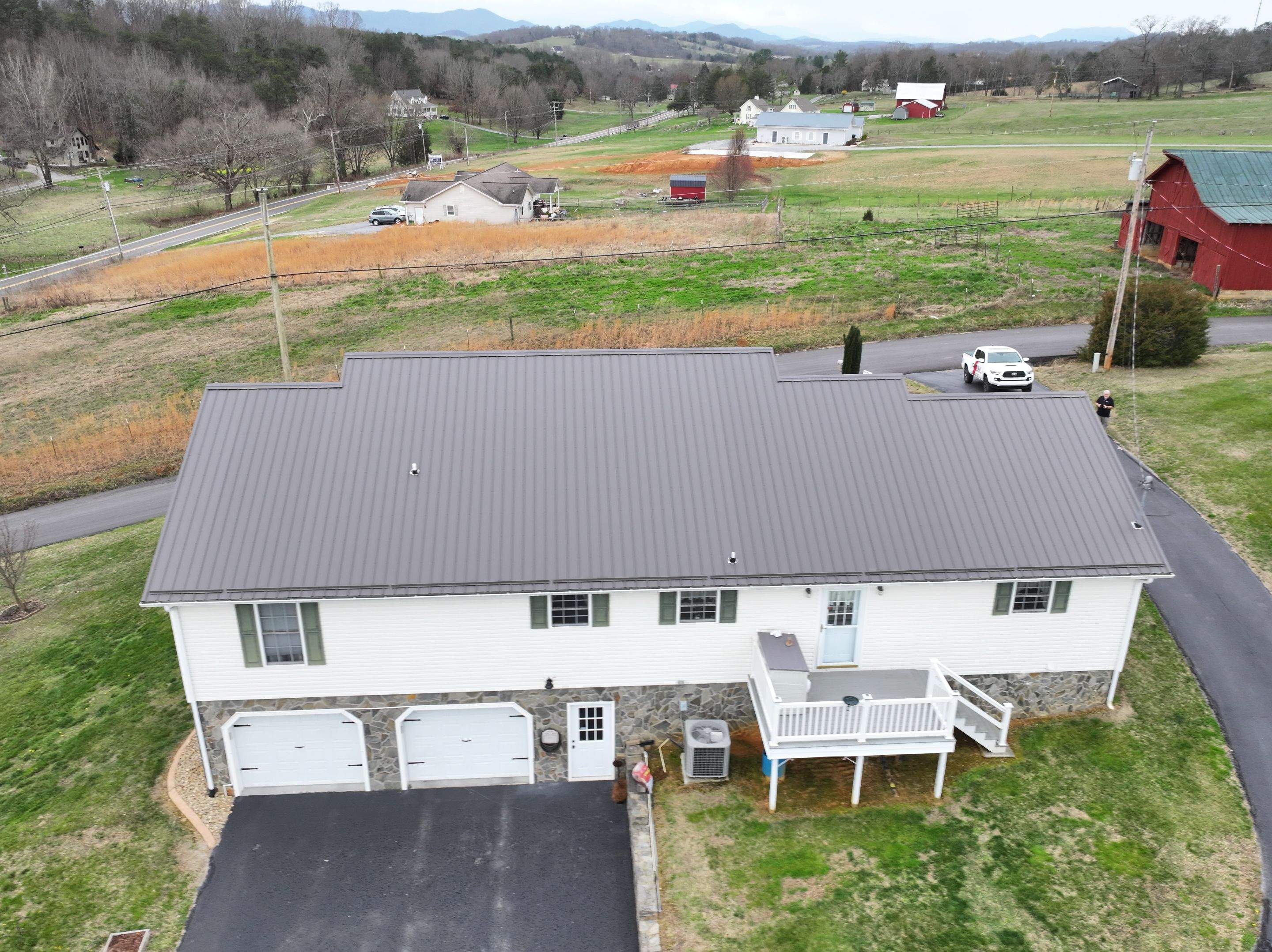 Lutackas Residence by Omnia Roofing