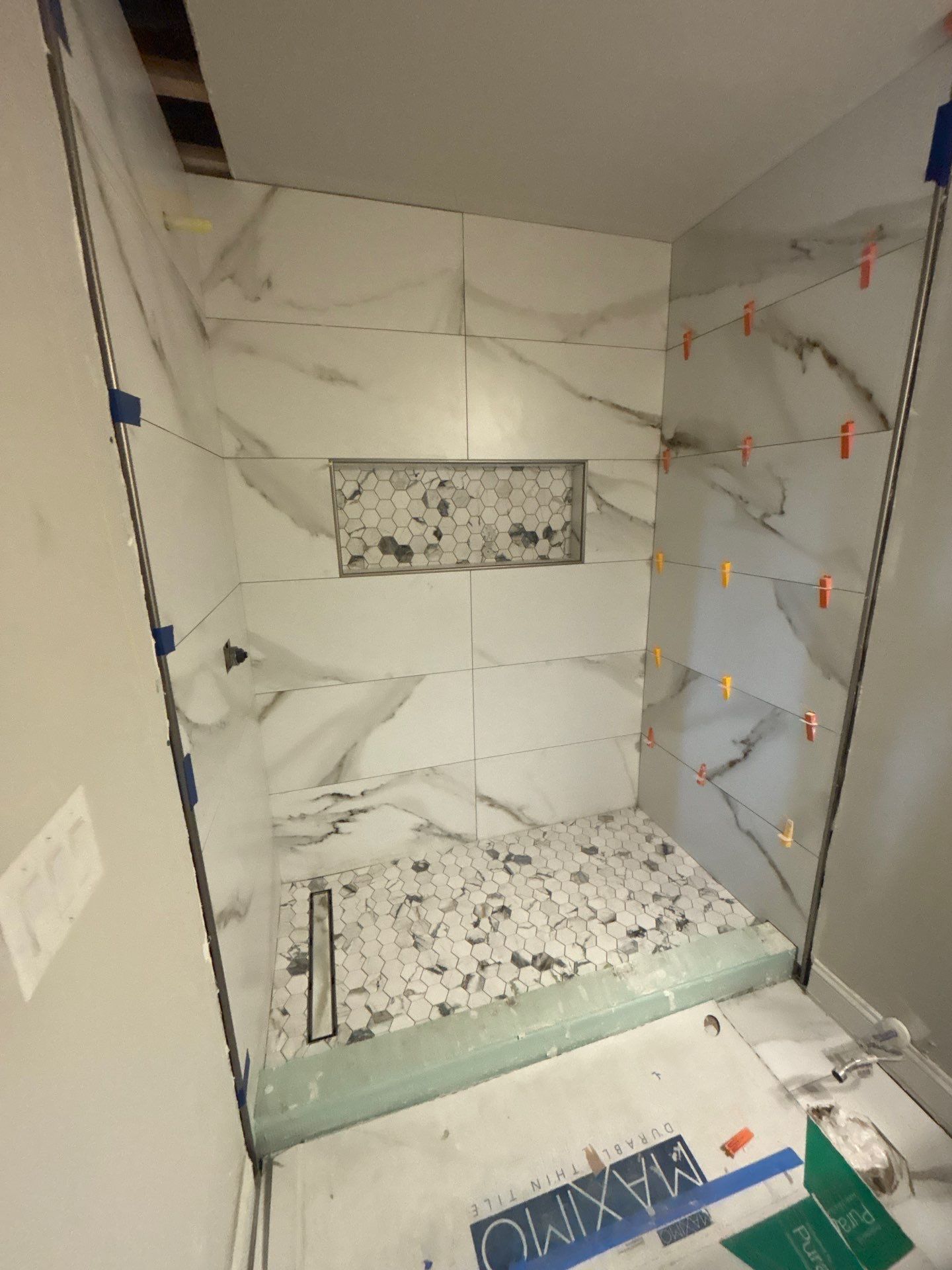 Three showers renovation by Prudencio