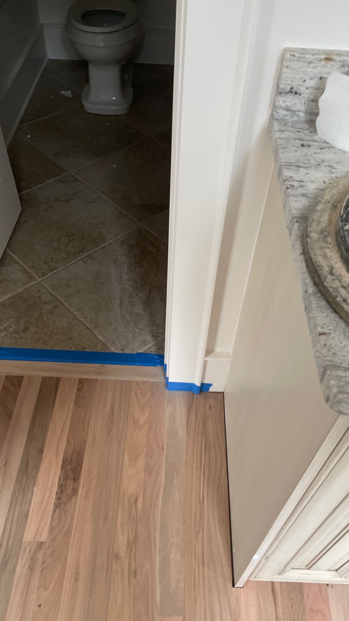 Herringbone Wood Hallway and Rooms by Footprints Floors of Coastal Carolina