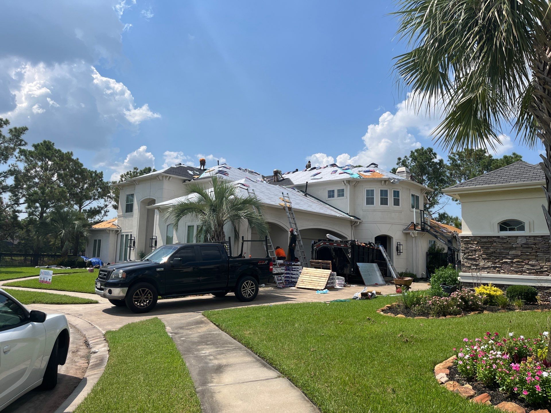 GAF HDZ Charcoal Roof Installation for Elegant Houston Home by Houston Roofing & Construction
