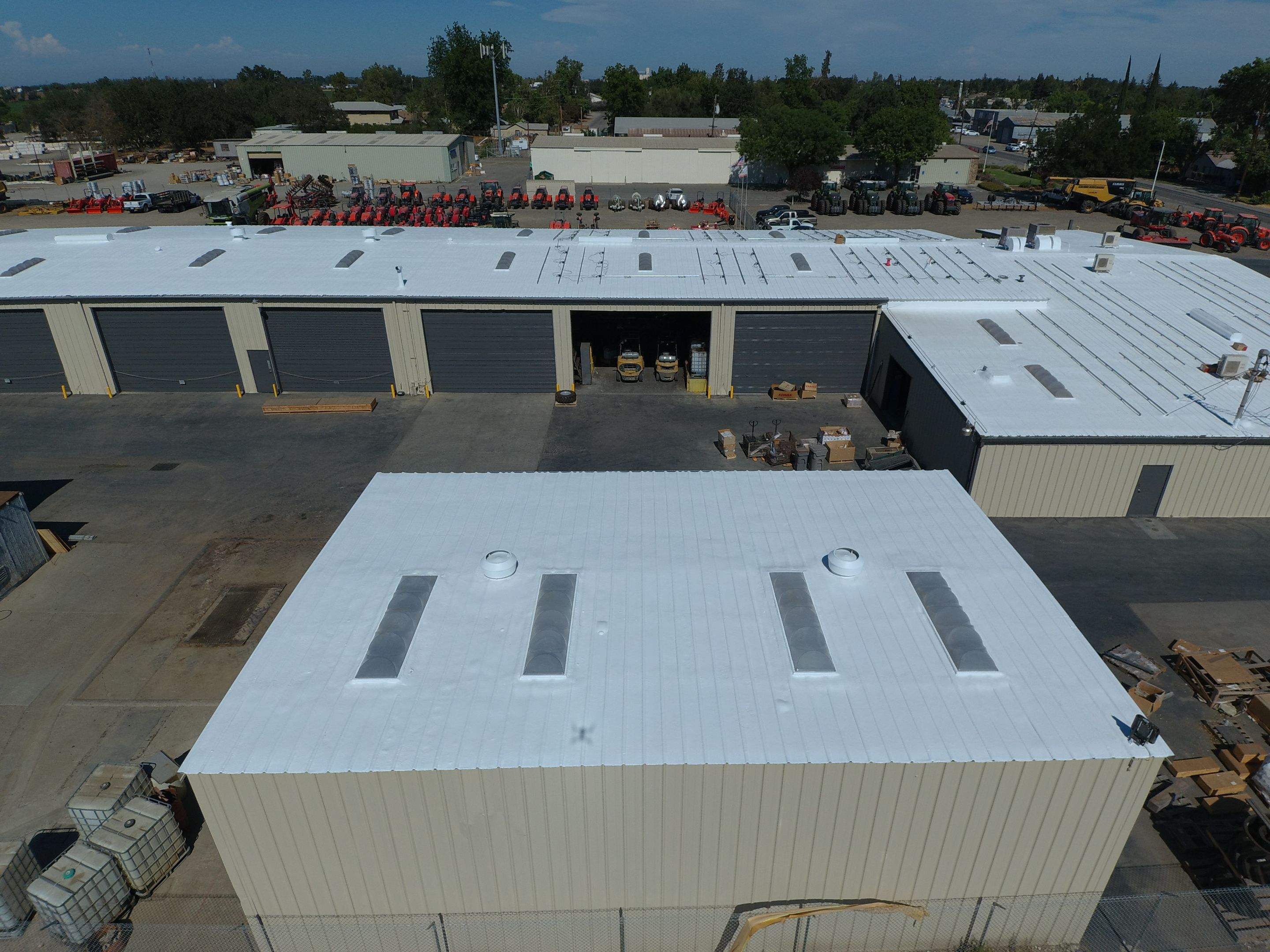 Spray foam and coatings using Conklin Benchmark/PUMA XL coatings and spray foam by Straight Edge Roofing Inc