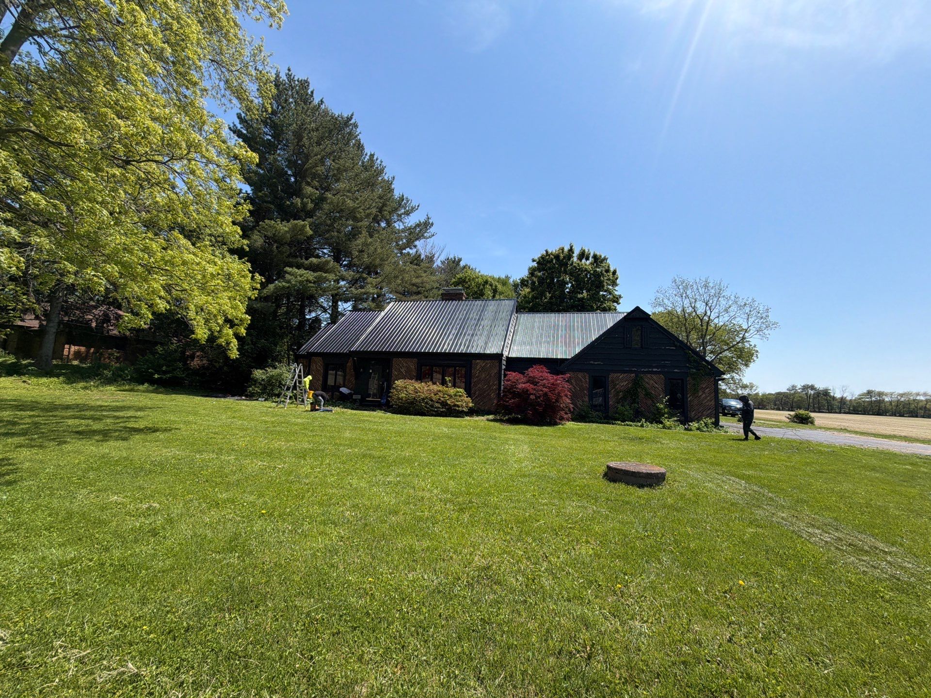 Classic Rib Metal Roofing - Shiny Black by Hoel Roofing & Remodeling
